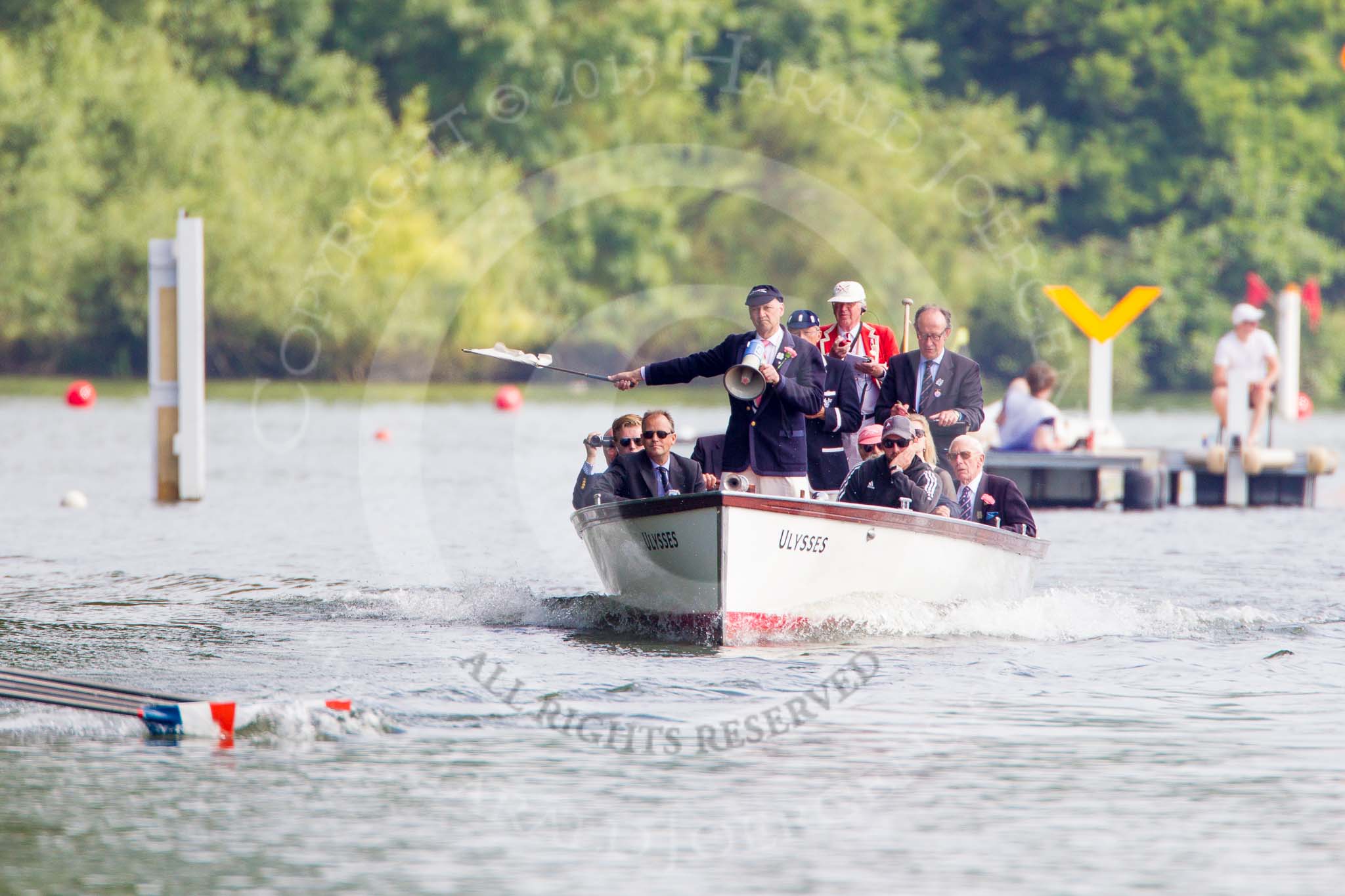 Henley Royal Regatta 2013, Saturday: The umpire's launch following the boats, seen shortly after the start of the race. Image #96, 06 July 2013 10:10 River Thames, Henley on Thames, UK