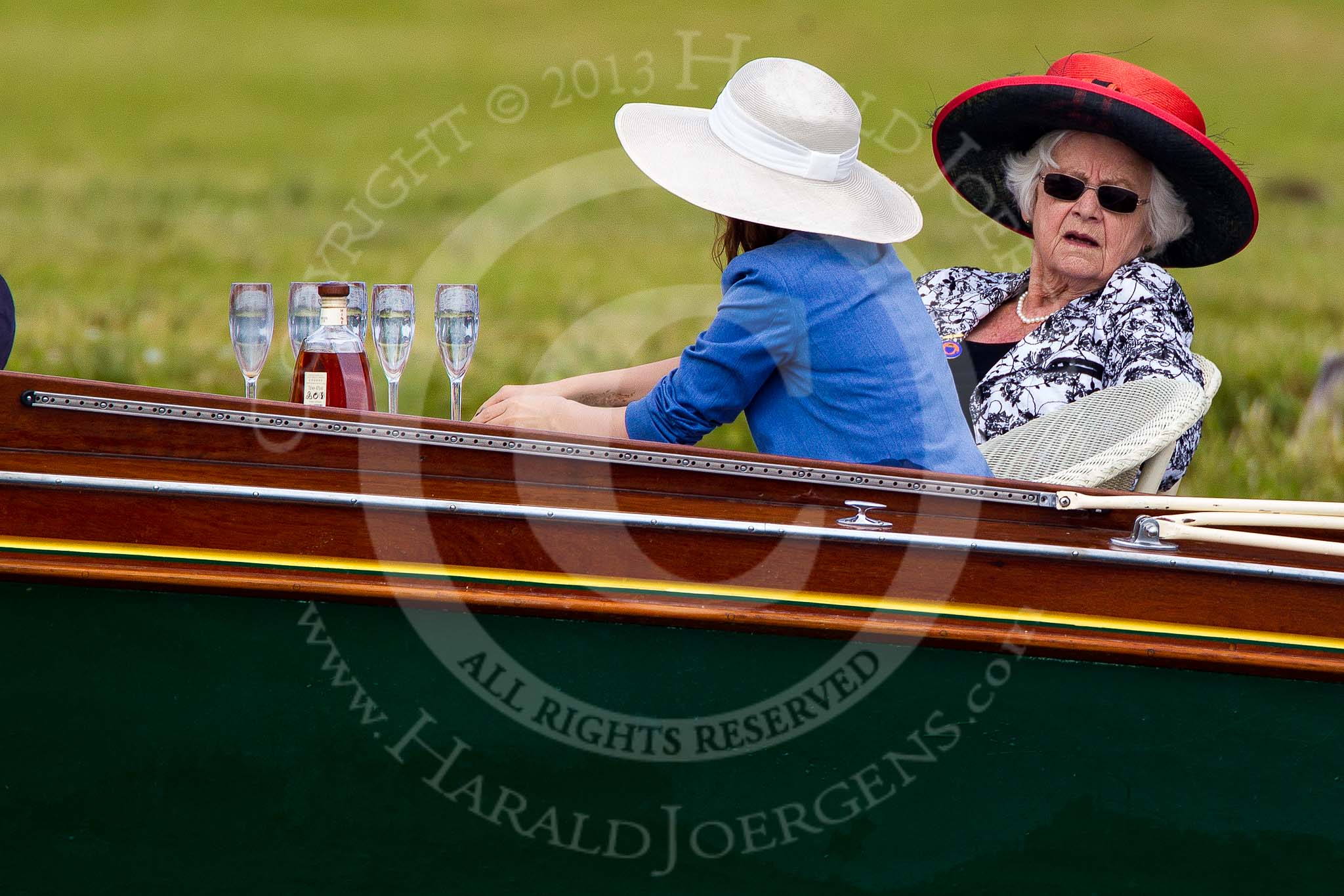 Henley Royal Regatta 2013, Saturday: Drinks (Hine Cognac), hats, and Henley Royal Regatta outfits on board the launch 'Fish Rising'. Image #188, 06 July 2013 11:13 River Thames, Henley on Thames, UK