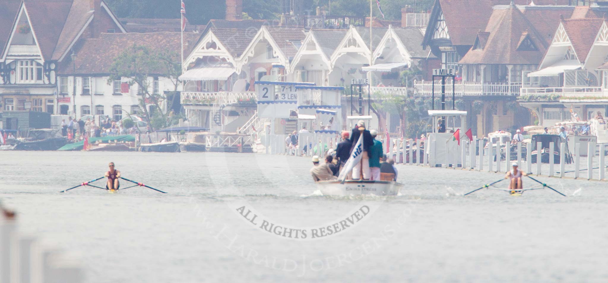 Henley Royal Regatta 2013, Saturday: Race No. 11 for the Princess Royal Challenge Cup, Victoria Thornley (Leander Club) v Emma Twigg (Waiariki Rowing Club, New Zealand), the umpire's launch following the boats, getting close to the 1-mile marker. Emma Twigg wins with 3 1/4 length. Image #240, 06 July 2013 11:43 River Thames, Henley on Thames, UK