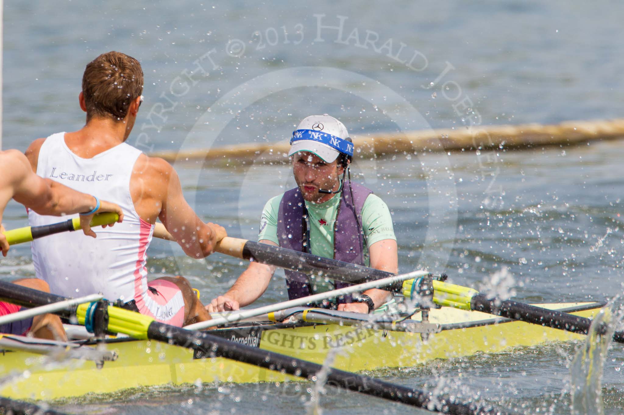 Henley Royal Regatta 2013, Saturday: Race No. 14 for the Ladies' Challenge Cup, Leander Club and Molesey Boat Club v University of Washington (U.S.A.), here Leander and Molesey cox Fieldman. Image #278, 06 July 2013 12:11 River Thames, Henley on Thames, UK