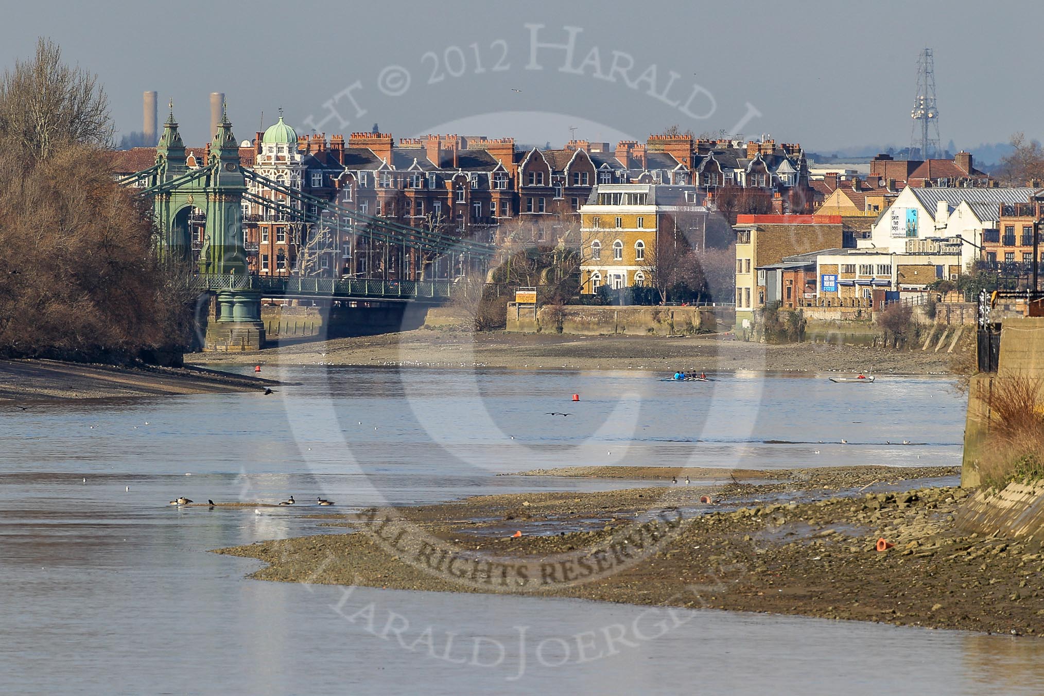 The Boat Race season 2012 - fixture OUBC vs German U23: View from the balcony of the Thames Rowing Club, along the race course, towards Hammersmith Bridge and the Surrey Bend..
River Thames between Putney and Mortlake,
London,

United Kingdom,
on 26 February 2012 at 13:50, image #1