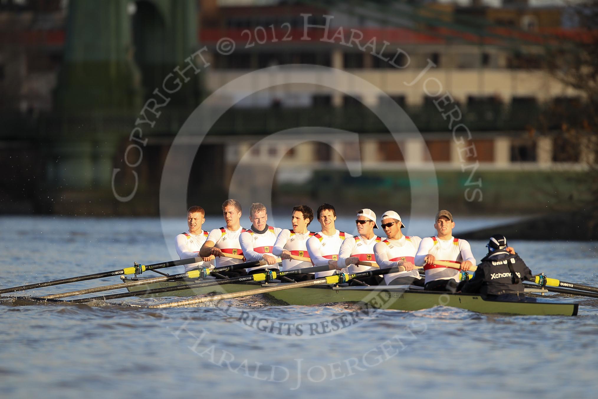 The Boat Race season 2012 - fixture OUBC vs German U23: The German U23 boat, after finishing the first race, in front of Hammersmith Bridge. From left to right bow Maximilian Johanning, Rene Stüven, Robin Ponte, Alexander Thierfelder, Malte Jakschik, Maximilian Planer, Felix Wimberger, stern Lukas-Frederik Müller, cox Oskar Zorilla..
River Thames between Putney and Mortlake,
London,

United Kingdom,
on 26 February 2012 at 15:38, image #78