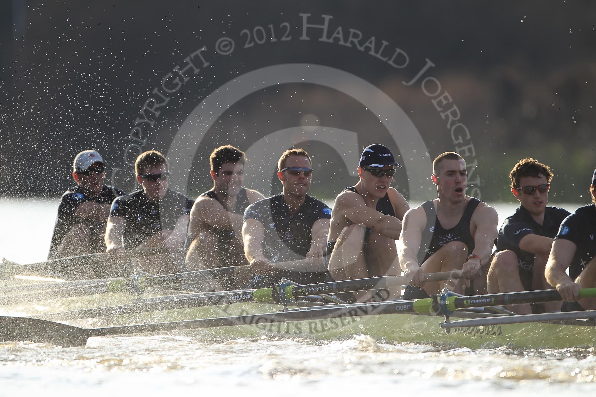 The Boat Race season 2012 - fixture OUBC vs German U23: Approaching the finish line of the second race, the Oxford Blue Boat, from left to right bow Dr. Alexander Woods, Geordie MacLeod, Kevin Baum, Dr. Hanno Wienhausen, Karl Hudspith, Alex Davidson, and Dan Harvey..
River Thames between Putney and Mortlake,
London,

United Kingdom,
on 26 February 2012 at 15:46, image #91