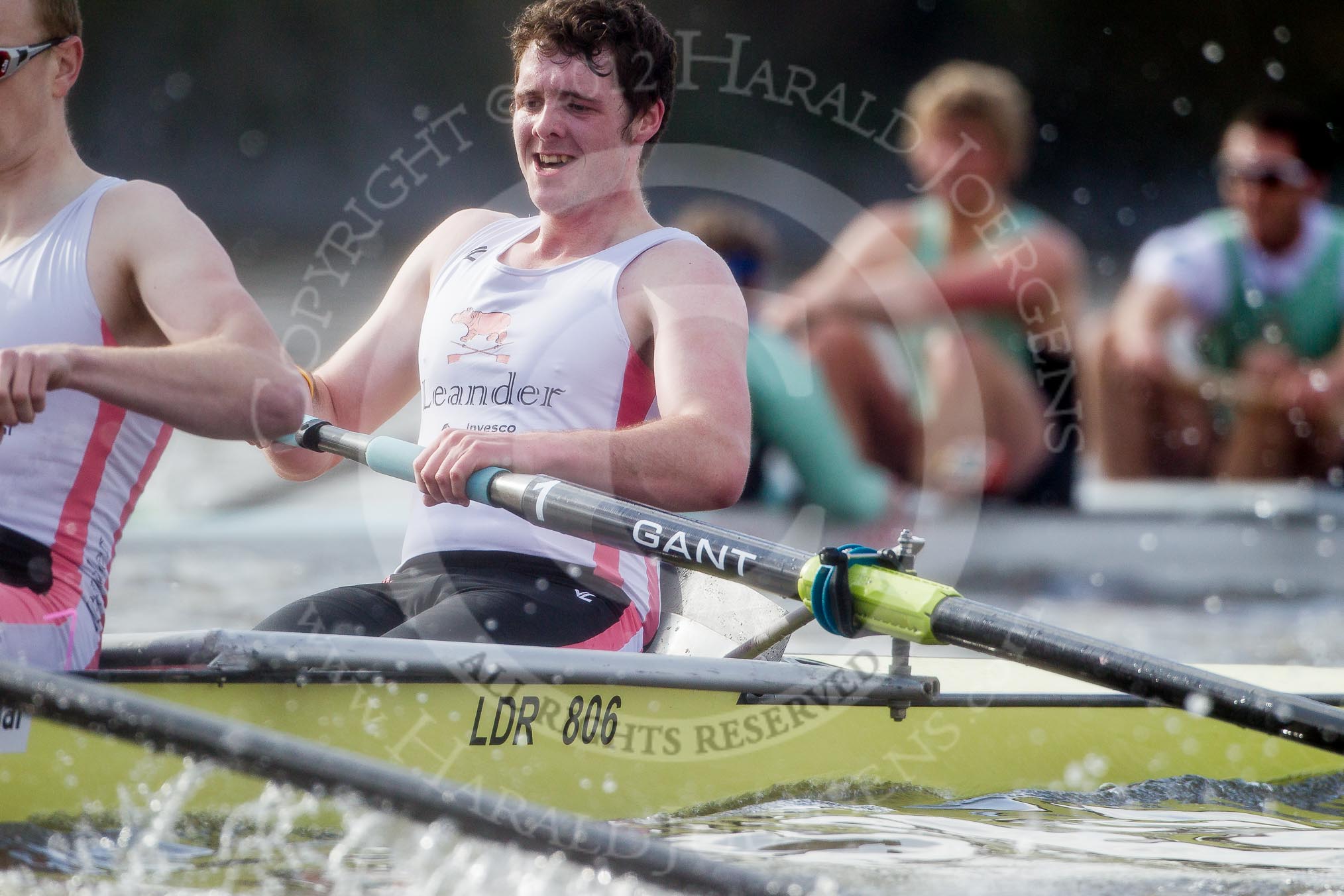 The Boat Race season 2012 - fixture CUBC vs Leander: The Leander Club Eight:  Close-up of bow Oliver Holt, behind, and in the lead, the Cambridge Eight..
River Thames between Putney and Molesey,
London,
Greater London,
United Kingdom,
on 10 March 2012 at 14:19, image #147