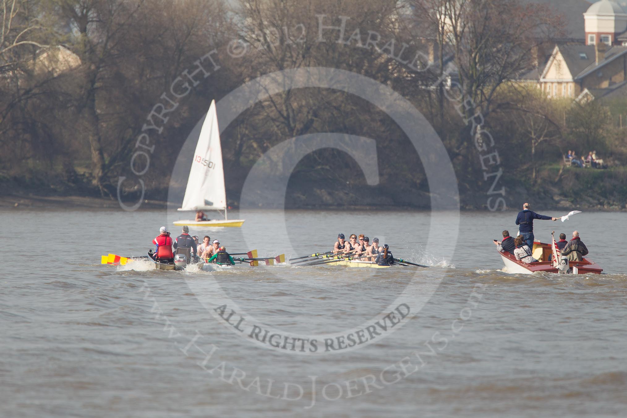 The Boat Race season 2012 - fixture OUBC vs Leander: The all-to-be-named Tideway Scullers squad against OUBC's Isis, hbow Tom Hilton, Chris Fairweather, Julian Bubb-Humfryes, Ben Snodin, Joe Dawson, Geordie Macleod, Justin Webb, stroke Tom Watson, and cox Katherine Apfelbaum, behind them umpire Boris Rankov..




on 24 March 2012 at 14:02, image #84