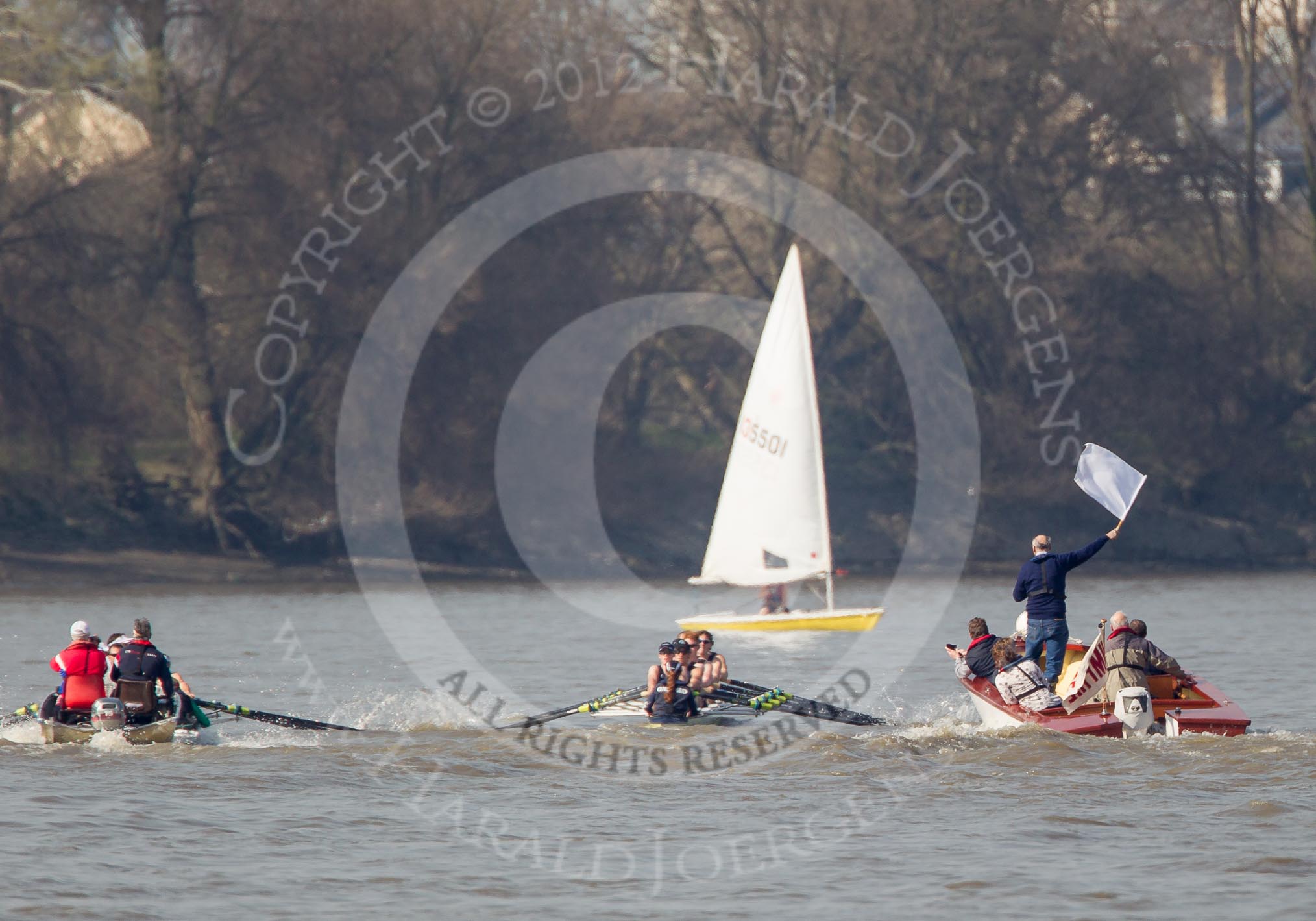 The Boat Race season 2012 - fixture OUBC vs Leander: The all-to-be-named Tideway Scullers squad against OUBC's Isis, hbow Tom Hilton, Chris Fairweather, Julian Bubb-Humfryes, Ben Snodin, Joe Dawson, Geordie Macleod, Justin Webb, stroke Tom Watson, and cox Katherine Apfelbaum, on the right umpire Boris Rankov..




on 24 March 2012 at 14:02, image #85