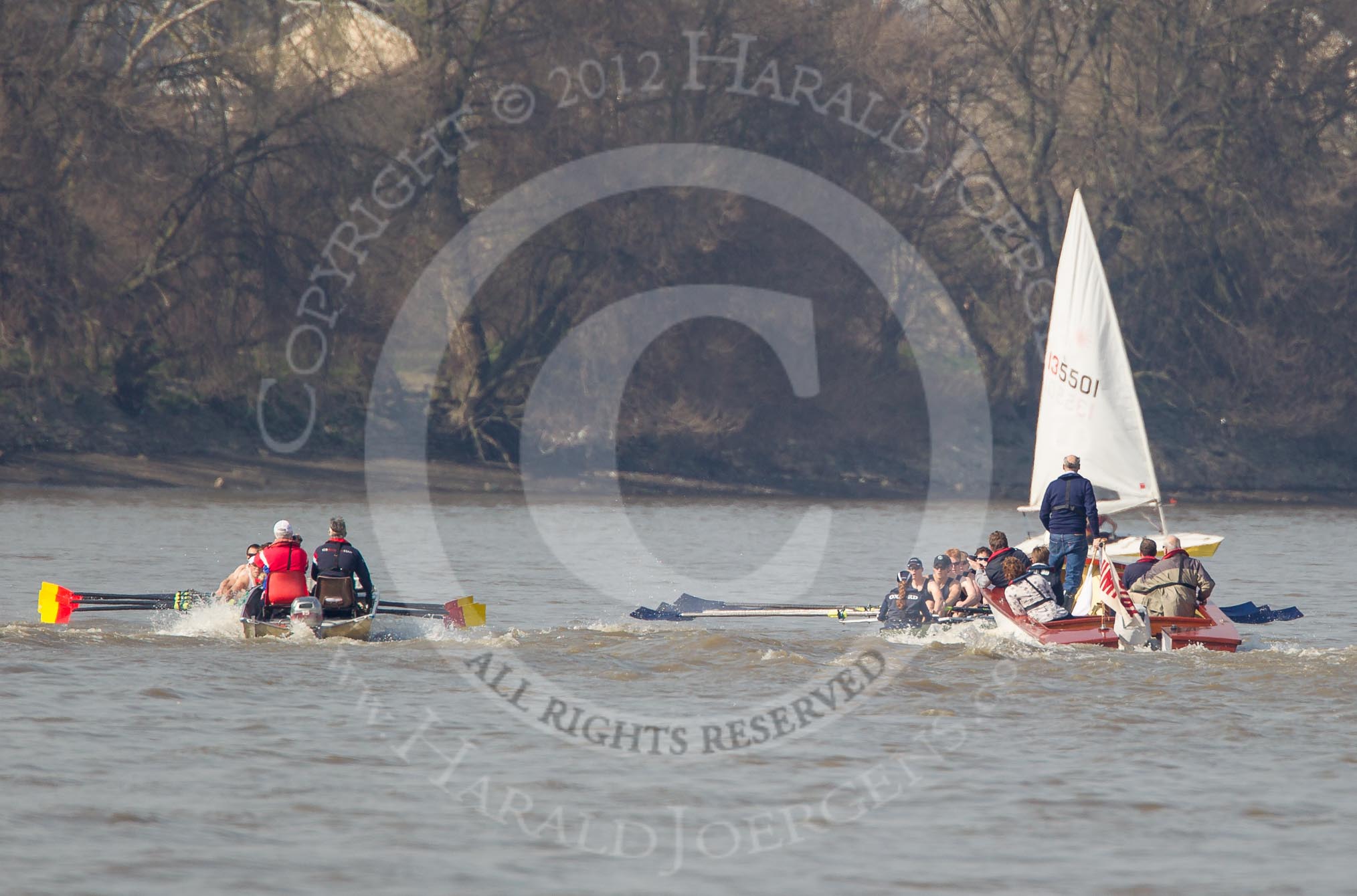 The Boat Race season 2012 - fixture OUBC vs Leander: Tideway Scullers, on the left, racing OUBC's Isis team, behind umpire Boris Rankov..




on 24 March 2012 at 14:02, image #86