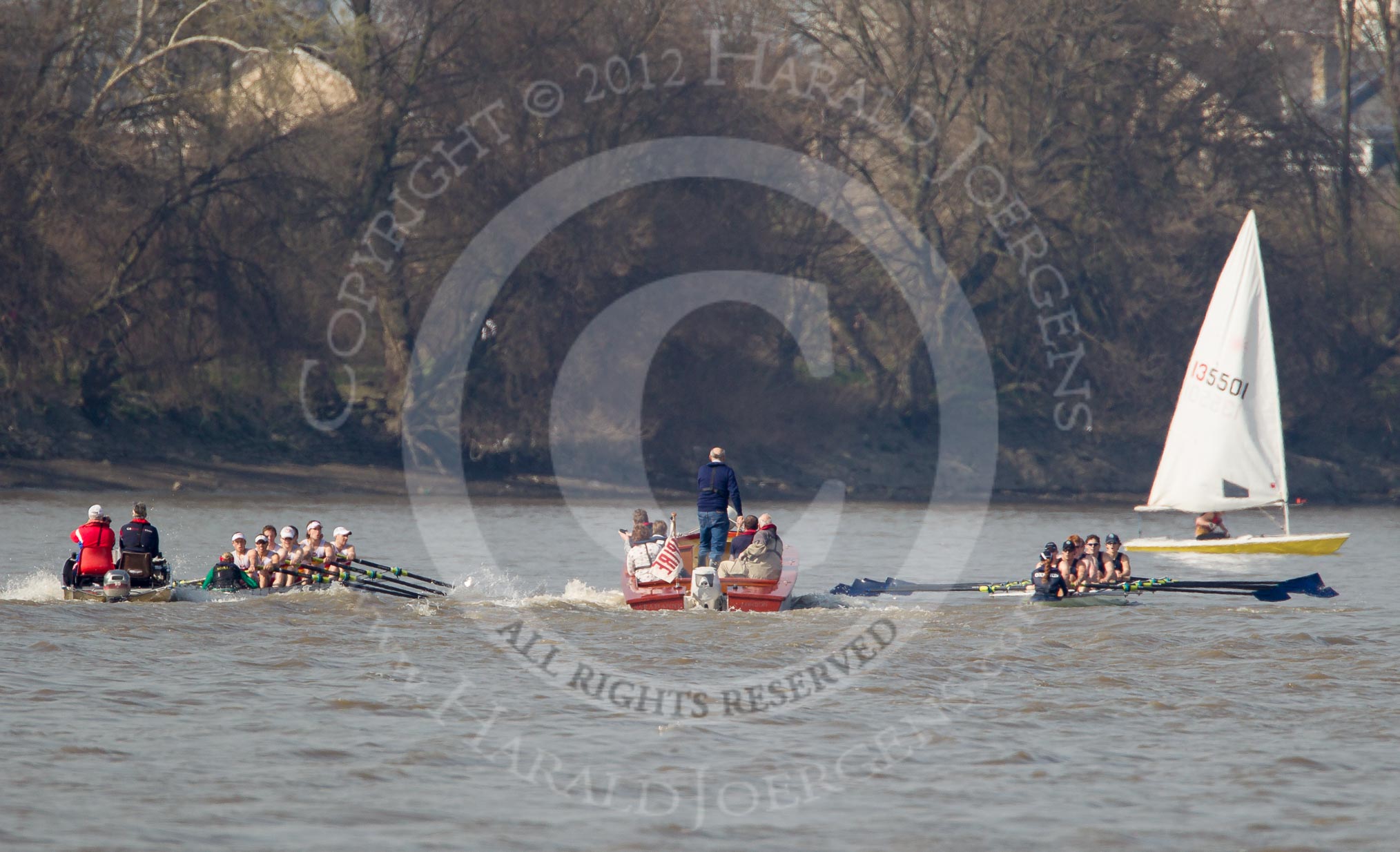 The Boat Race season 2012 - fixture OUBC vs Leander: Tideway Scullers, on the left, racing OUBC's Isis team, behind umpire Boris Rankov..




on 24 March 2012 at 14:02, image #87