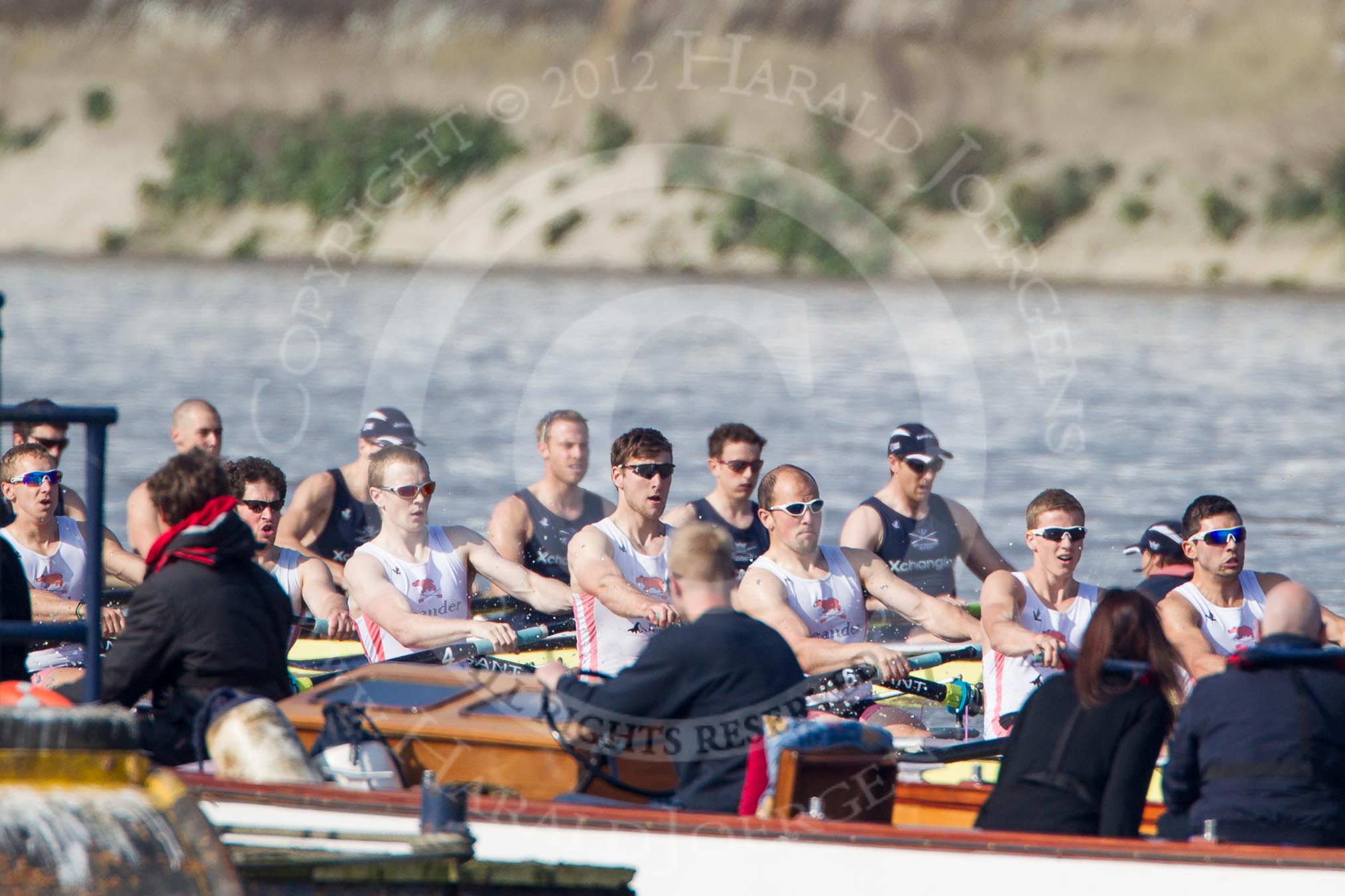 Photo 1203241430071D42970HaraldJoergens The Boat Race season 2012 - fixture OUBC vs Leander: OUBC Blue Boat in the lead - 2 William Zeng, 3 Kevin Baum, 4 Alexander Davidson, 5 Karl Hudspith, 6 Dr. Hanno Wienhausen, 7 Dan Harvey, stroke Roel Haen, cox Zoe de Toledo, in the Leander boat bow Nathan Hillyer, Chris Friend, Will Gray, Sam Whittaker, Tom Clark, John Clay, Cameron MacRitchie, stroke Vasillis Ragoussis, and cox Katie Klavenes..
on 24 March 2012 at 14:30, image #122