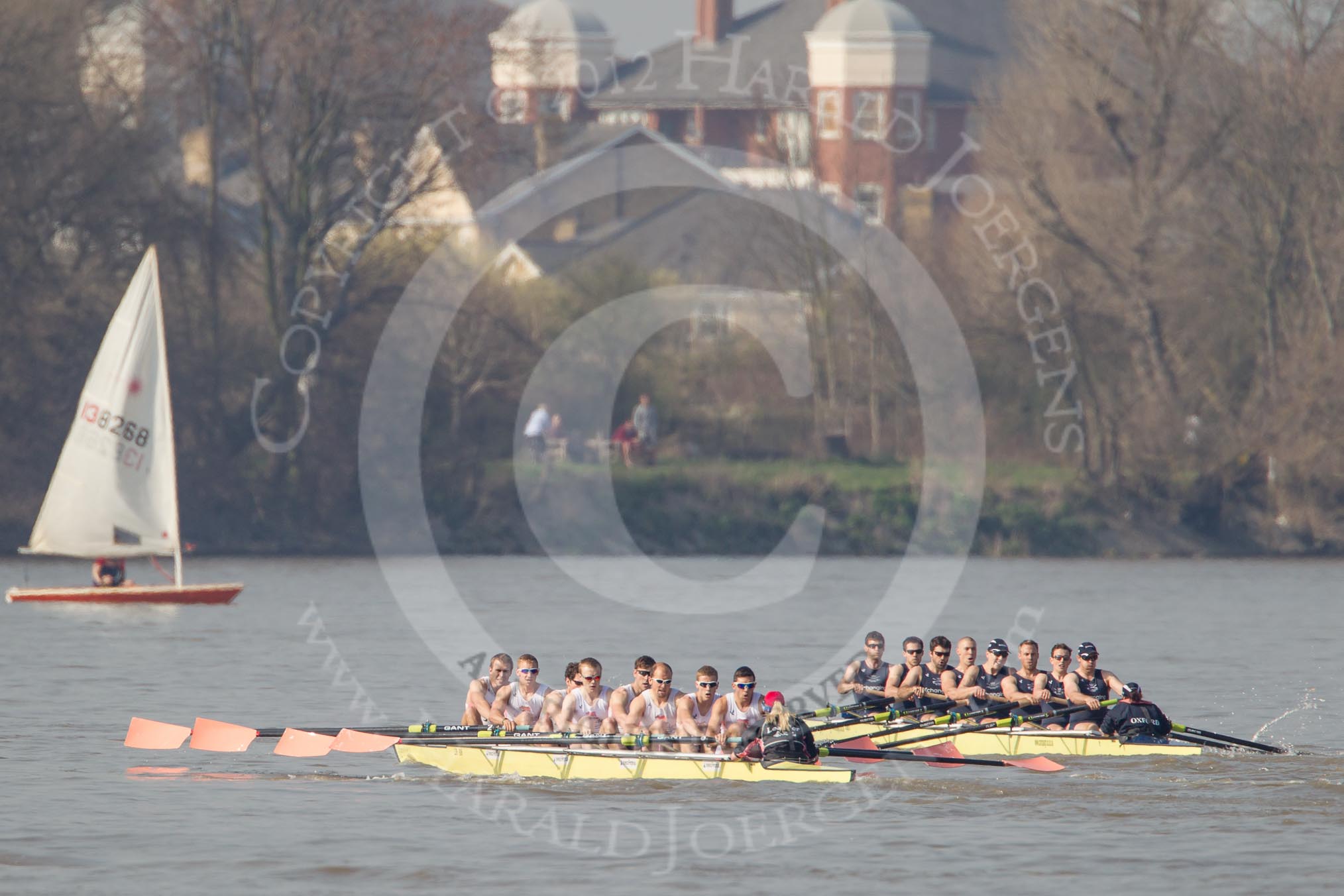 Photo 1203241430301D42999HaraldJoergens The Boat Race season 2012 - fixture OUBC vs Leander: OUBC Blue Boat in the lead - 2 William Zeng, 3 Kevin Baum, 4 Alexander Davidson, 5 Karl Hudspith, 6 Dr. Hanno Wienhausen, 7 Dan Harvey, stroke Roel Haen, cox Zoe de Toledo, in the Leander boat bow Nathan Hillyer, Chris Friend, Will Gray, Sam Whittaker, Tom Clark, John Clay, Cameron MacRitchie, stroke Vasillis Ragoussis, and cox Katie Klavenes..
on 24 March 2012 at 14:30, image #128