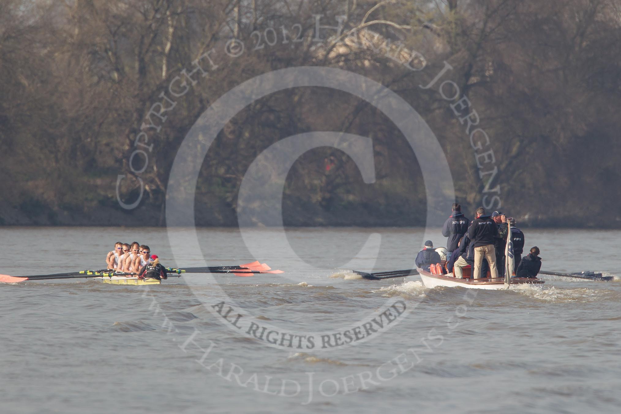 Photo 1203241430491D43020HaraldJoergens The Boat Race season 2012 - fixture OUBC vs Leander: OUBC Blue Boat in the lead - 2 William Zeng, 3 Kevin Baum, 4 Alexander Davidson, 5 Karl Hudspith, 6 Dr. Hanno Wienhausen, 7 Dan Harvey, stroke Roel Haen, cox Zoe de Toledo, in the Leander boat bow Nathan Hillyer, Chris Friend, Will Gray, Sam Whittaker, Tom Clark, John Clay, Cameron MacRitchie, stroke Vasillis Ragoussis, and cox Katie Klavenes. Behind the two boats the umpire Richard Phelps..
on 24 March 2012 at 14:30, image #132