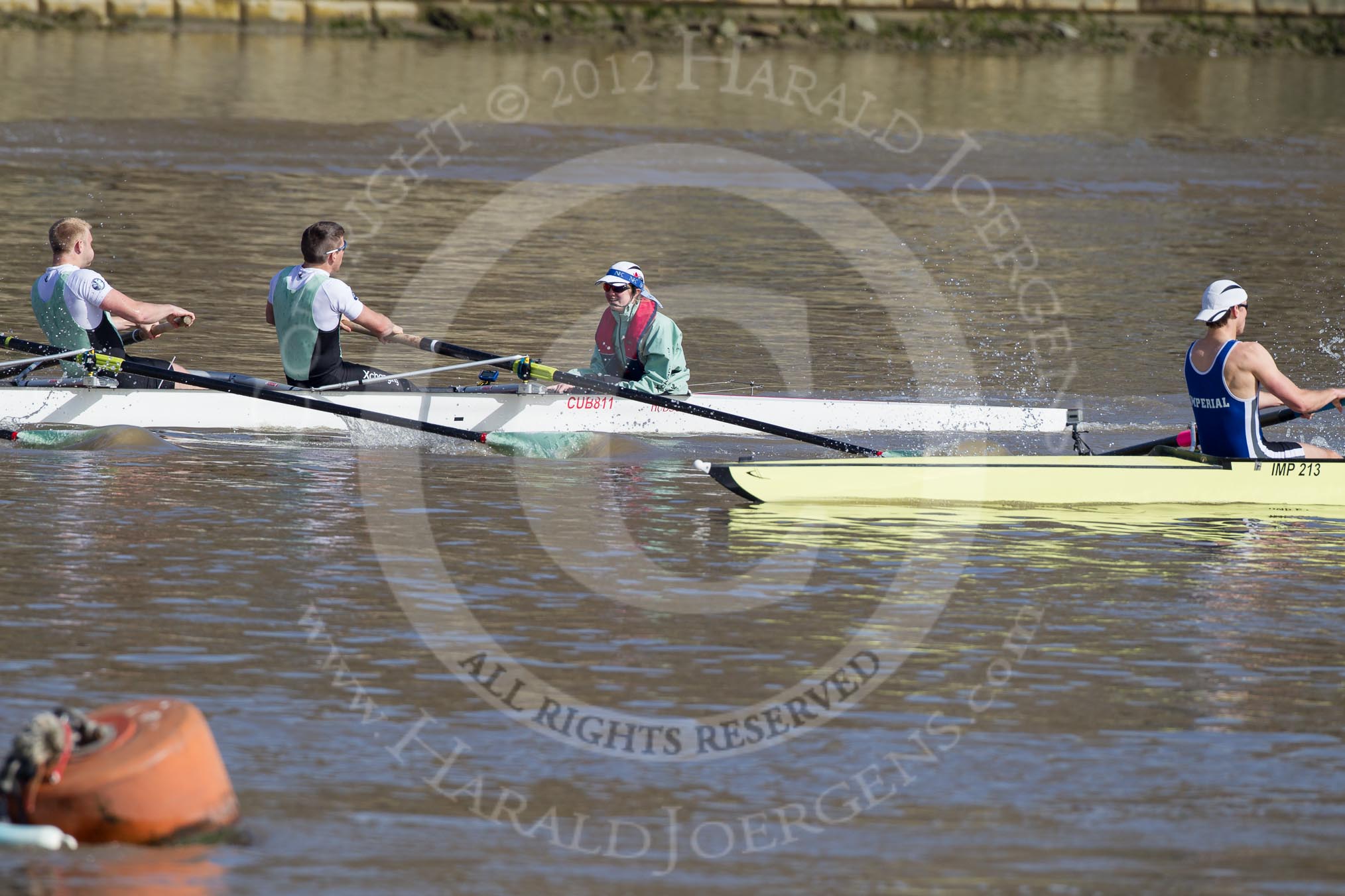 The Boat Race season 2012 - fixture CUBC vs Molesey BC: The Cambridge reserve boat Goldie racing Imperial BC: On the Cambridge side Philip Williams, stroke Felix Wood, and cox Sarah Smart, bowman for Imperial is Alex Gillies..




on 25 March 2012 at 14:46, image #46