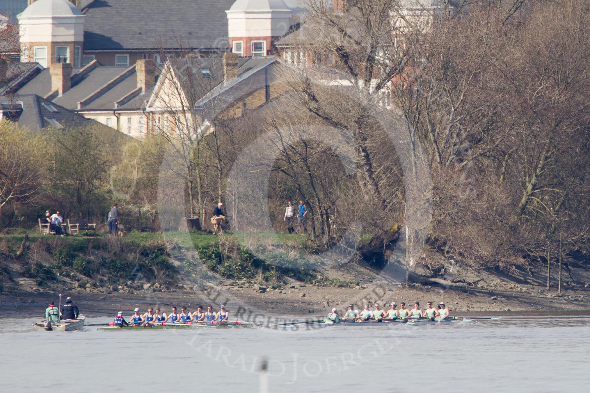 The Boat Race season 2012 - fixture CUBC vs Molesey BC: CUBC Goldie v Imperial fixture: Goldie leading towards the Mile Post, behind  the Imperial boat umpire Simon Harris..




on 25 March 2012 at 14:49, image #70