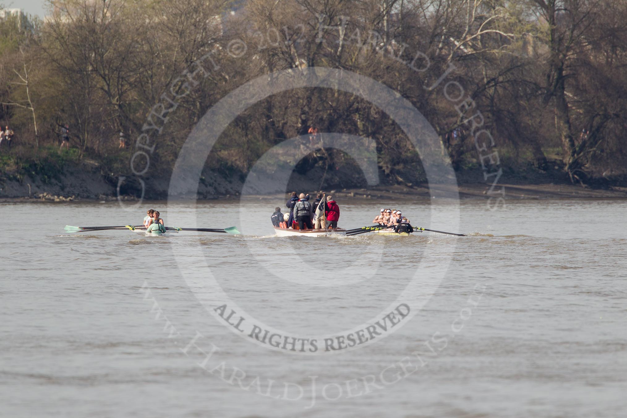 The Boat Race season 2012 - fixture CUBC vs Molesey BC: The CUBC Blue Boat on the left, the Molesey BC Eight on the right, behind them umpire Boris Rankov..




on 25 March 2012 at 15:20, image #137
