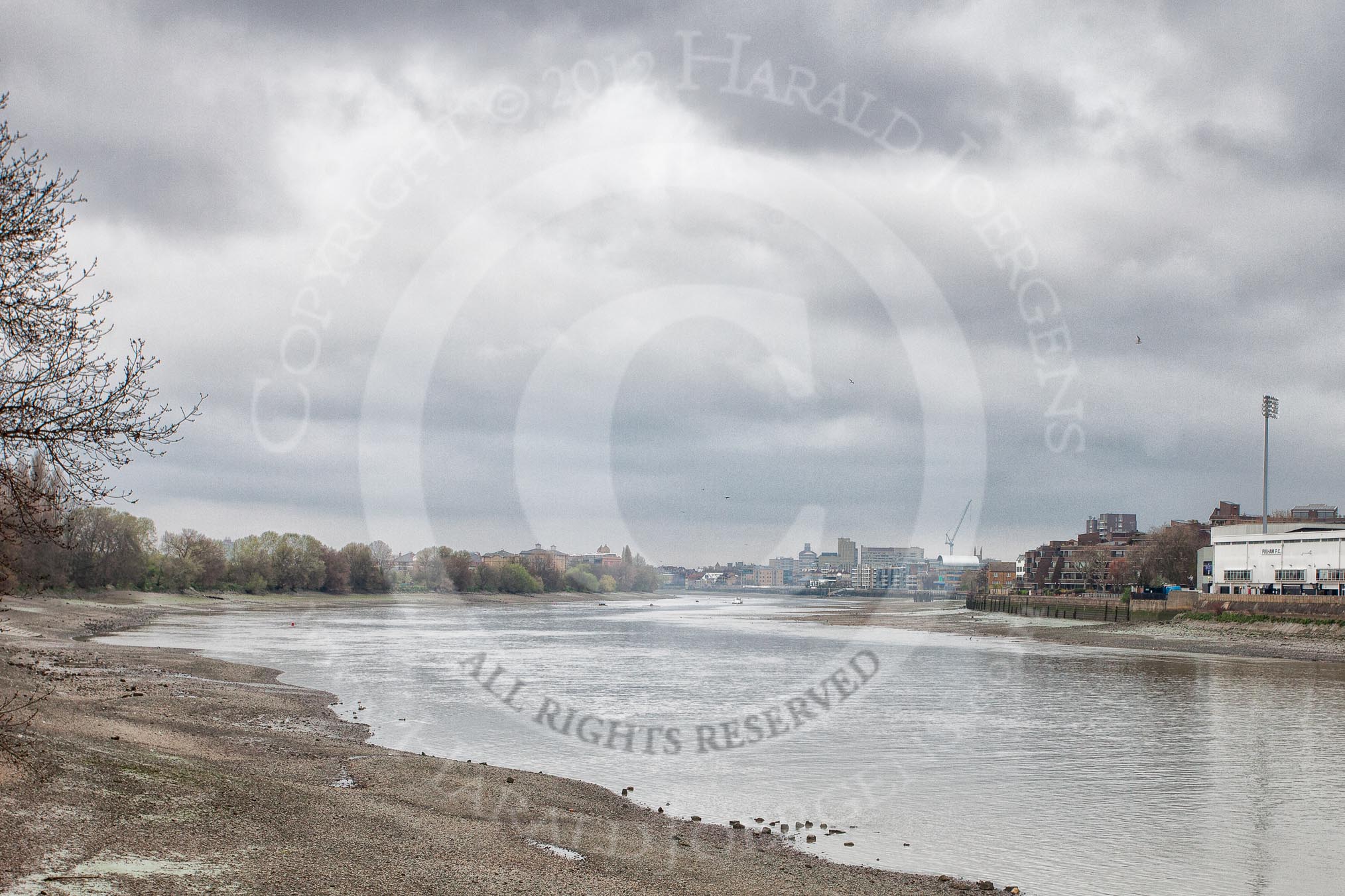 The Boat Race 2012: Setting the scene for the 2012 Boat Race:  The River Thames, seen in the direction of the Boat Race, at low tide. On the right Fulham FC Stadium..




on 07 April 2012 at 09:46, image #15