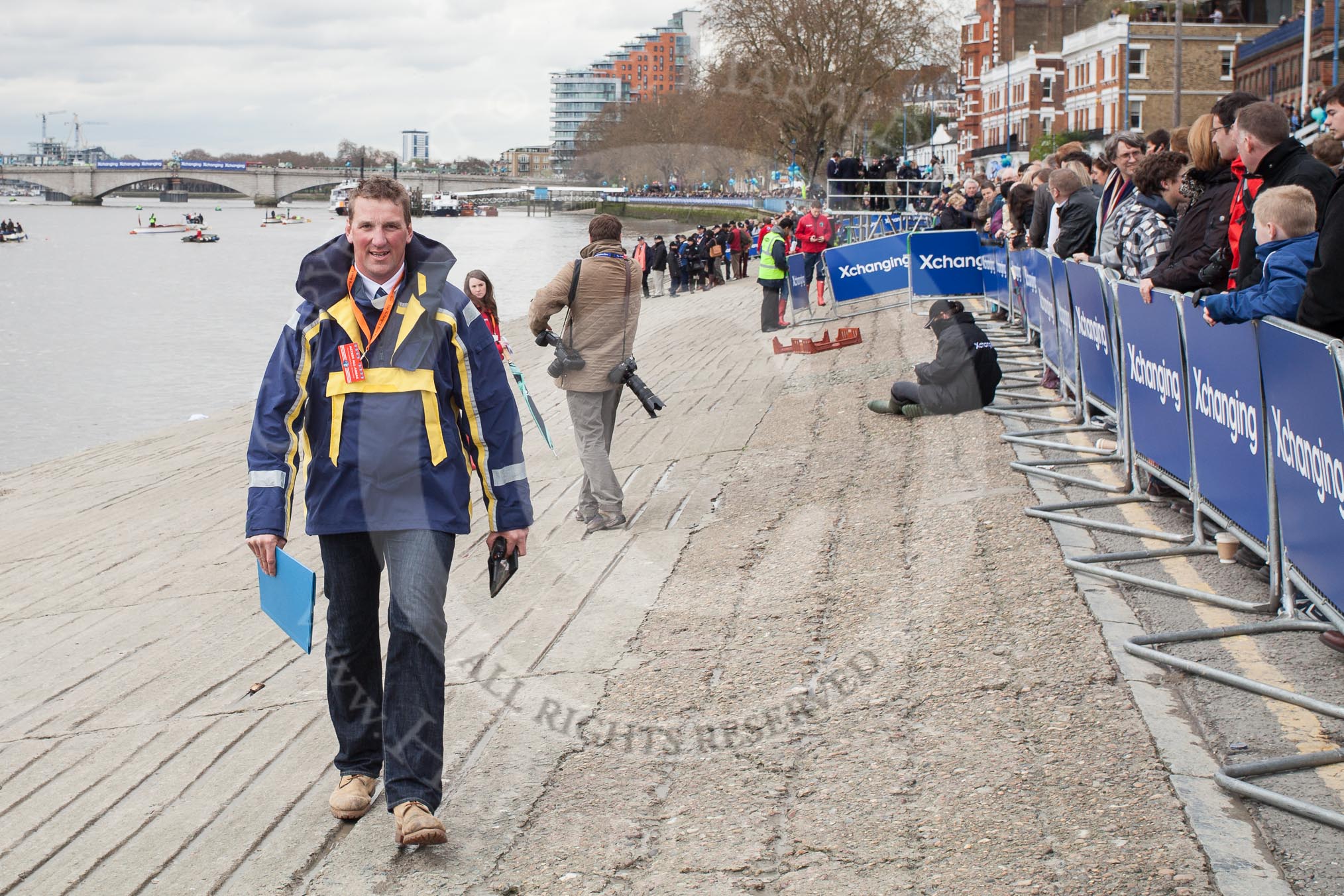 The Boat Race 2012: Sir Matthew Pinsent, reserve umpire and former ten times rowing world championship gold medallist. Behind him, in red, last years Cambridge Blue Boat cox Liz Box..




on 07 April 2012 at 13:19, image #123