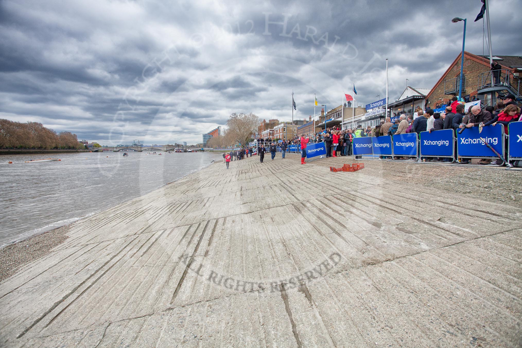 The Boat Race 2012: Setting the scene for the 2012 Boat Race:  Putney Embankment, looking towards Putney Bridge. The blue Xchanging barriers on the right have been opened so the boats can be moved on the Thames..




on 07 April 2012 at 13:21, image #124
