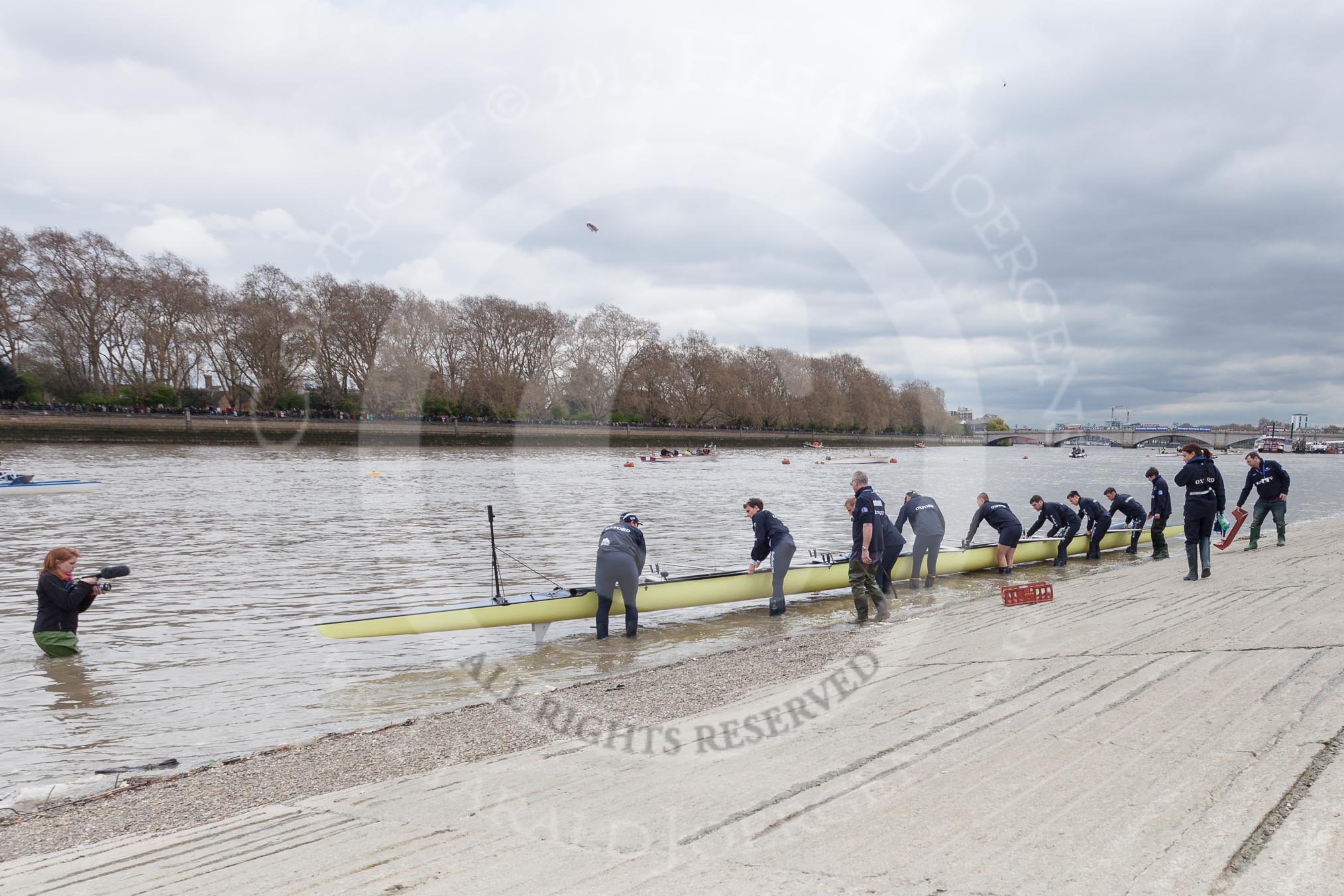 The Boat Race 2012: The Oxford Blue Boat carried to the Thames for the Boat Race. On the right of the boat cox Zoe de Toldeo and Pat Lockley, Oxford boat house manager, standing in the Thames Hannah Madsen of www.AngelSharp.com..




on 07 April 2012 at 13:24, image #129