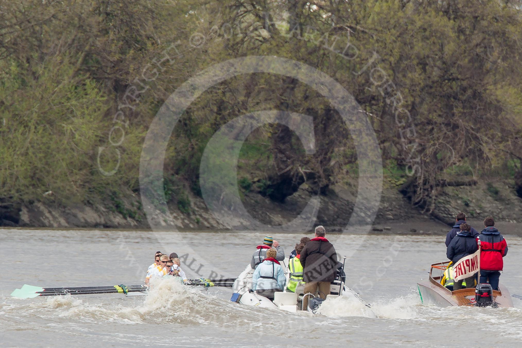 The Boat Race 2012: The Goldie/Isis Boat Race: Approaching the Mile Post. Goldie on the left,  on the right umpire Richard Phelps..




on 07 April 2012 at 13:47, image #181