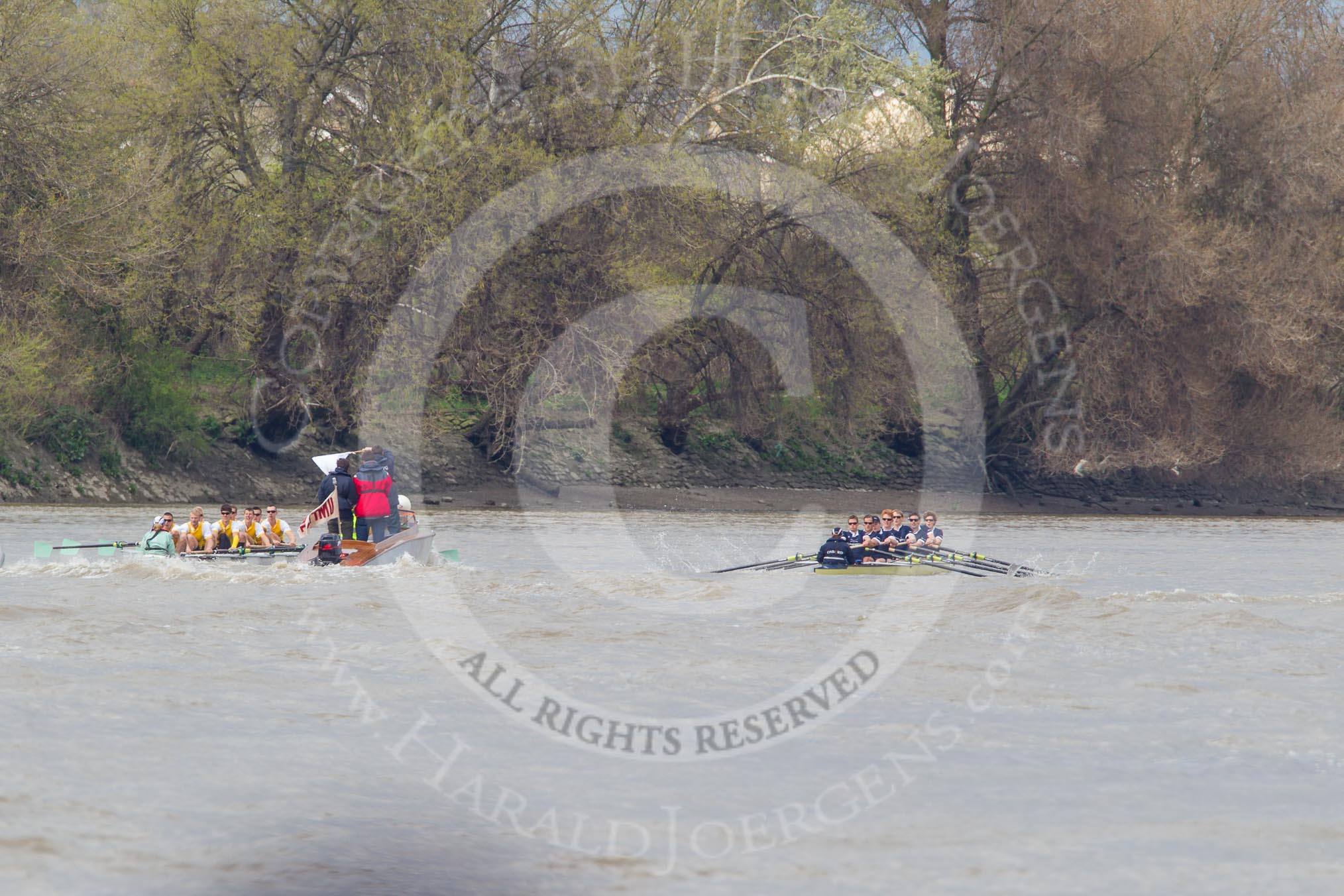 The Boat Race 2012: The Goldie/Isis Boat Race: Approaching the Mile Post, Goldie on the left, Isis on the right, behind in the middle umpire Richard Phelps..




on 07 April 2012 at 13:48, image #183
