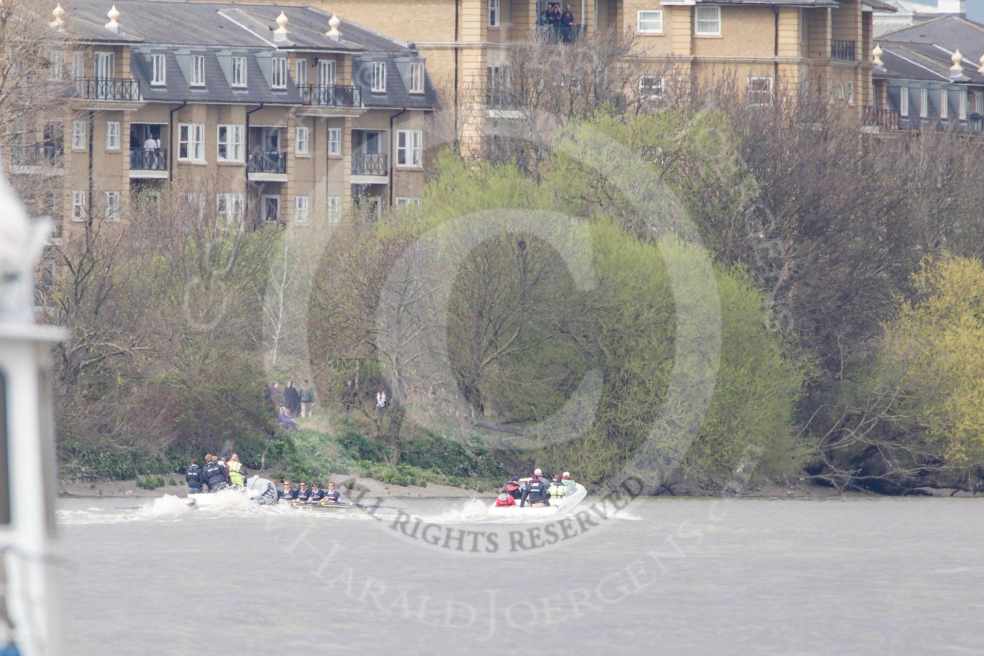 The Boat Race 2012: The Goldie/Isis Boat Race: Just passing the Mile Post, Goldie on the left, Isis on the right, behind in the middle umpire Richard Phelps..




on 07 April 2012 at 13:49, image #187