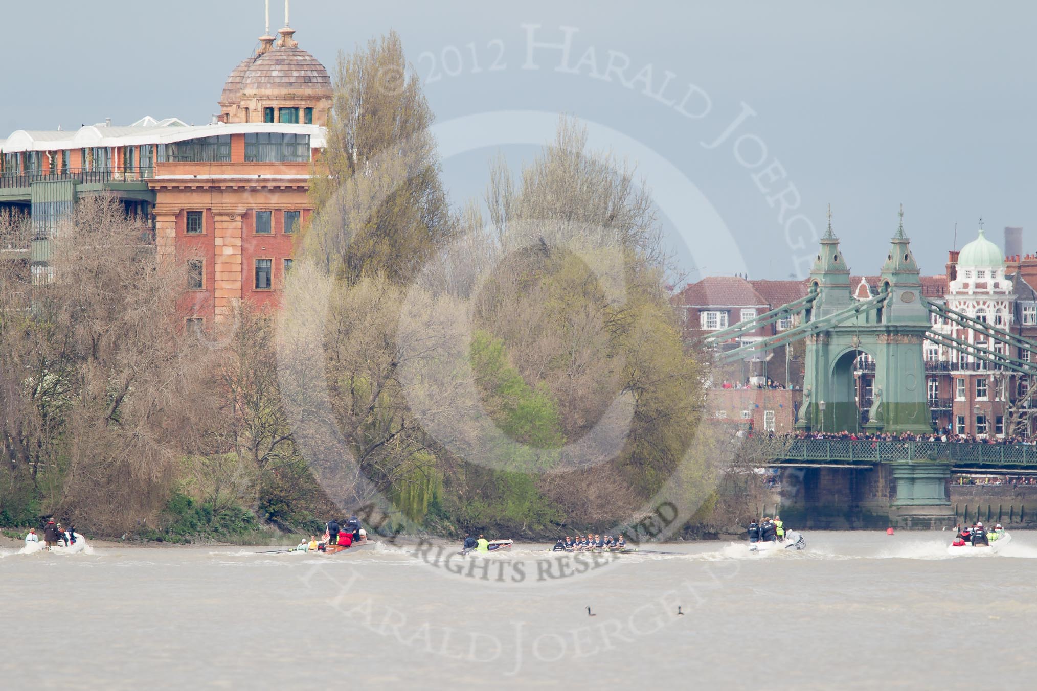 The Boat Race 2012: The Isis v Goldie Boat Race. The Oxford reserve boat Isis, on the right, in the lead, approaching Harrord Repository, behind Goldie race umpire John Garret..




on 07 April 2012 at 13:49, image #191