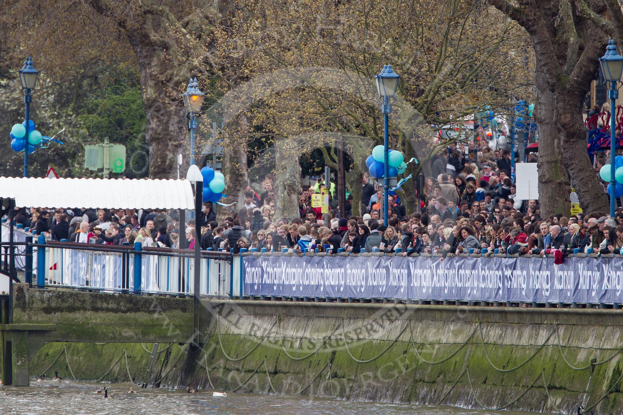 The Boat Race 2012: Putney Embankment, here seen towards Putney Bridge, with Putney Pier on the left, packed with spectators about to watch the start of the 2012 Boat Race..




on 07 April 2012 at 13:55, image #202