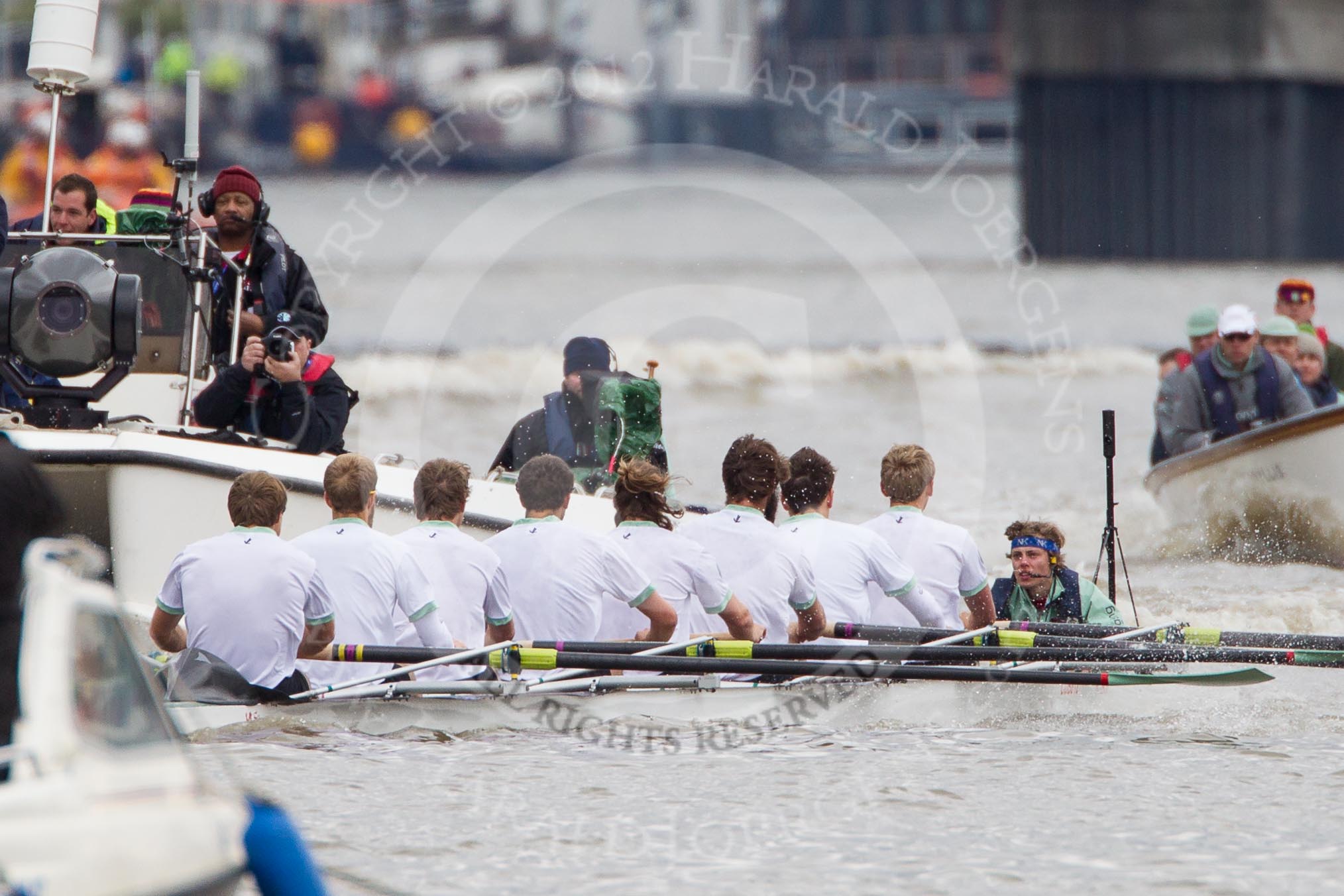 The Boat Race 2012: The Cambridge Blue Boat shortly after the start of the 2012 Boat Race, followed by a flotilla of boats. On the right of the Cambridge boat the race umpire. Bow David Nelson, Moritz Schramm, Jack Lindeman, Alex Ross, Mike Thorp, Steve Dudek, Alexander Scharp, stroke Niles Garratt, and cox Ed Bosson..




on 07 April 2012 at 14:16, image #229