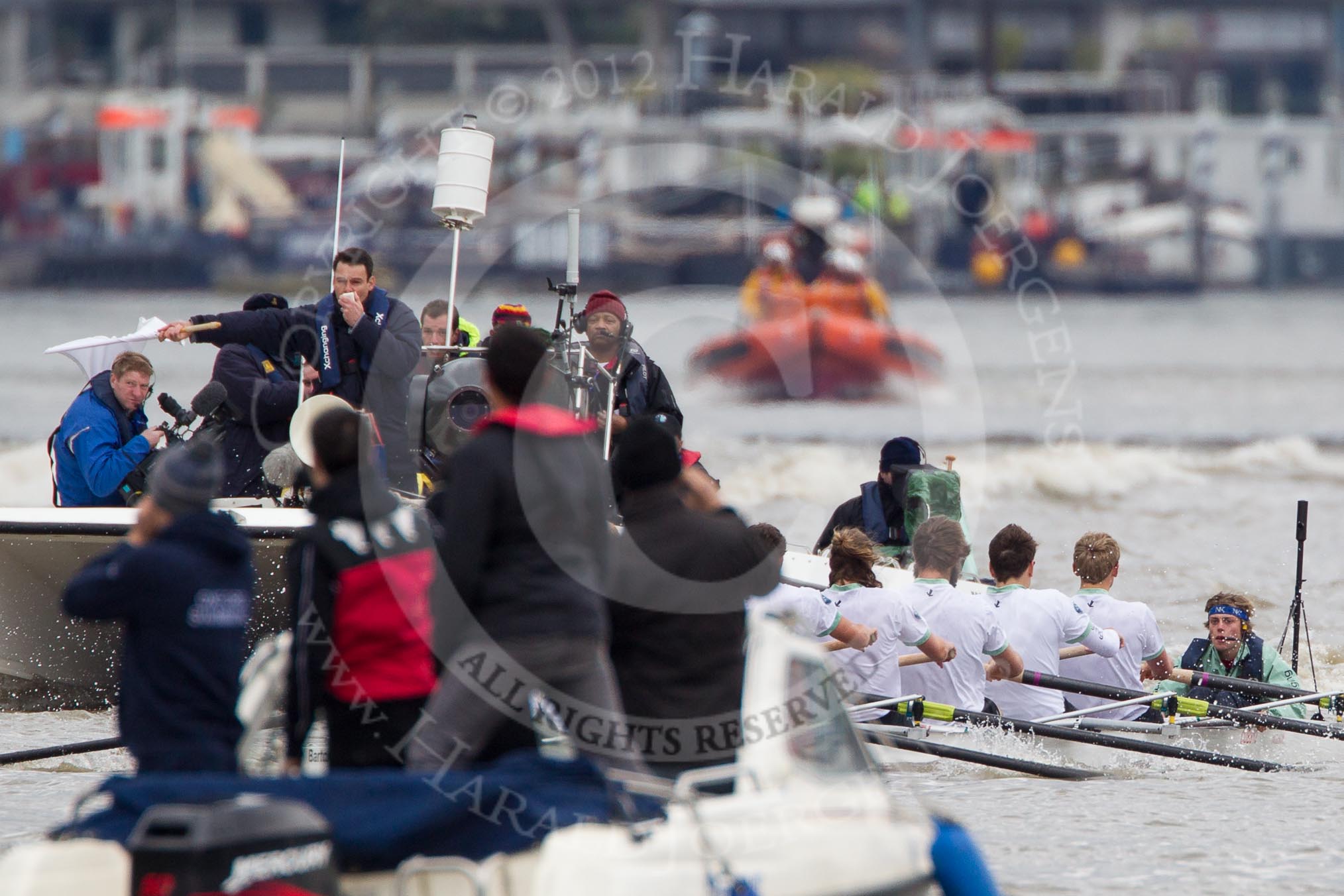The Boat Race 2012: The Cambridge Blue Boat shortly after the start of the 2012 Boat Race. On the right of the Cambridge boat the race umpire, Richard Phelps, and a BBC Sport/SIS television crew. Bow David Nelson, Moritz Schramm, Jack Lindeman, Alex Ross, Mike Thorp, Steve Dudek, Alexander Scharp, stroke Niles Garratt, and cox Ed Bosson..




on 07 April 2012 at 14:16, image #230