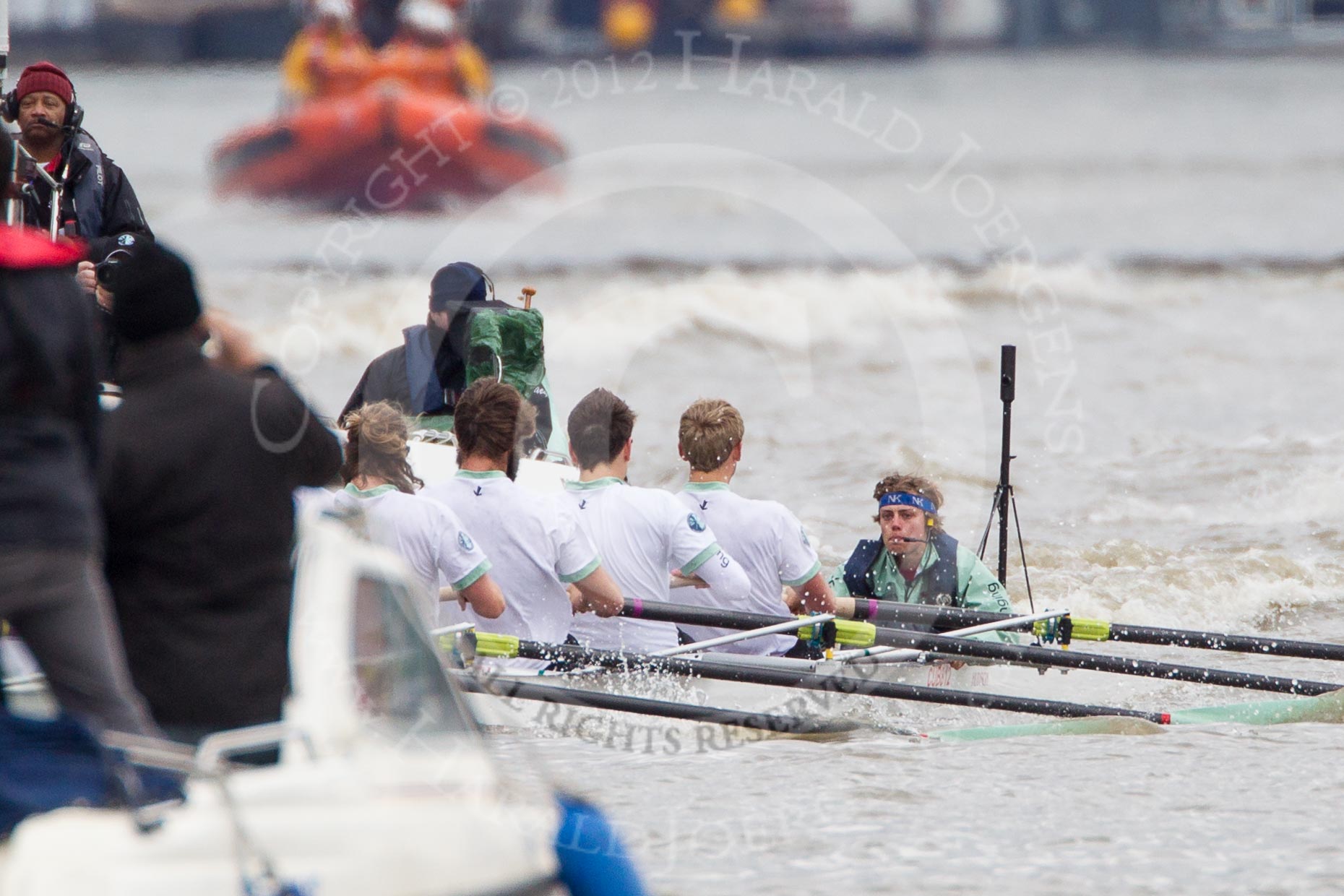 The Boat Race 2012: The Cambridge Blue Boat shortly after the start of the 2012 Boat Race, followed by a flotilla of boats. Bow David Nelson, Moritz Schramm, Jack Lindeman, Alex Ross, Mike Thorp, Steve Dudek, Alexander Scharp, stroke Niles Garratt, and cox Ed Bosson..




on 07 April 2012 at 14:16, image #231