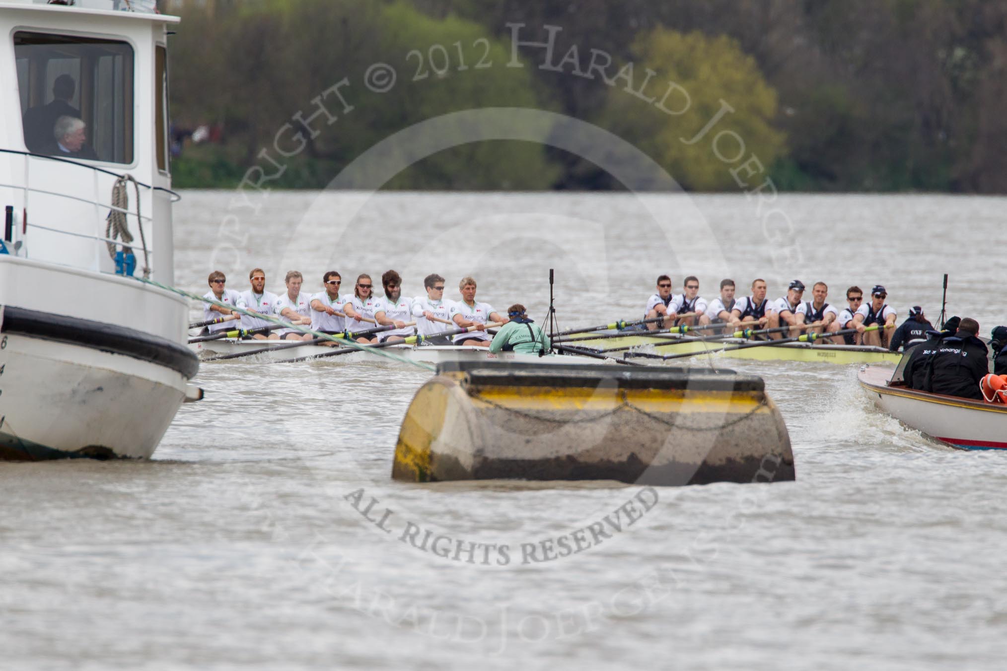 Photo 1204071417251D48457HaraldJoergens The Boat Race 2012: The 2012 Boat Race, shortly after the start: In the foreground the Cambridge Blue Boat, with David Nelson, Moritz Schramm, Jack Lindeman, Alex Ross, Mike Thorp, Steve Dudek, Alexander Scharp, Niles Garret, and cox Ed Bosson, in the Oxford boat Dr. Alexander Woods, William Zeng, Kevin Baum, Alex Davidson, Karl Hudspith, Dr. Hanno Wienhausen, Dan Harvey, stroke Roel Haen, and cox Zoe de Toledo..
on 07 April 2012 at 14:17, image #272