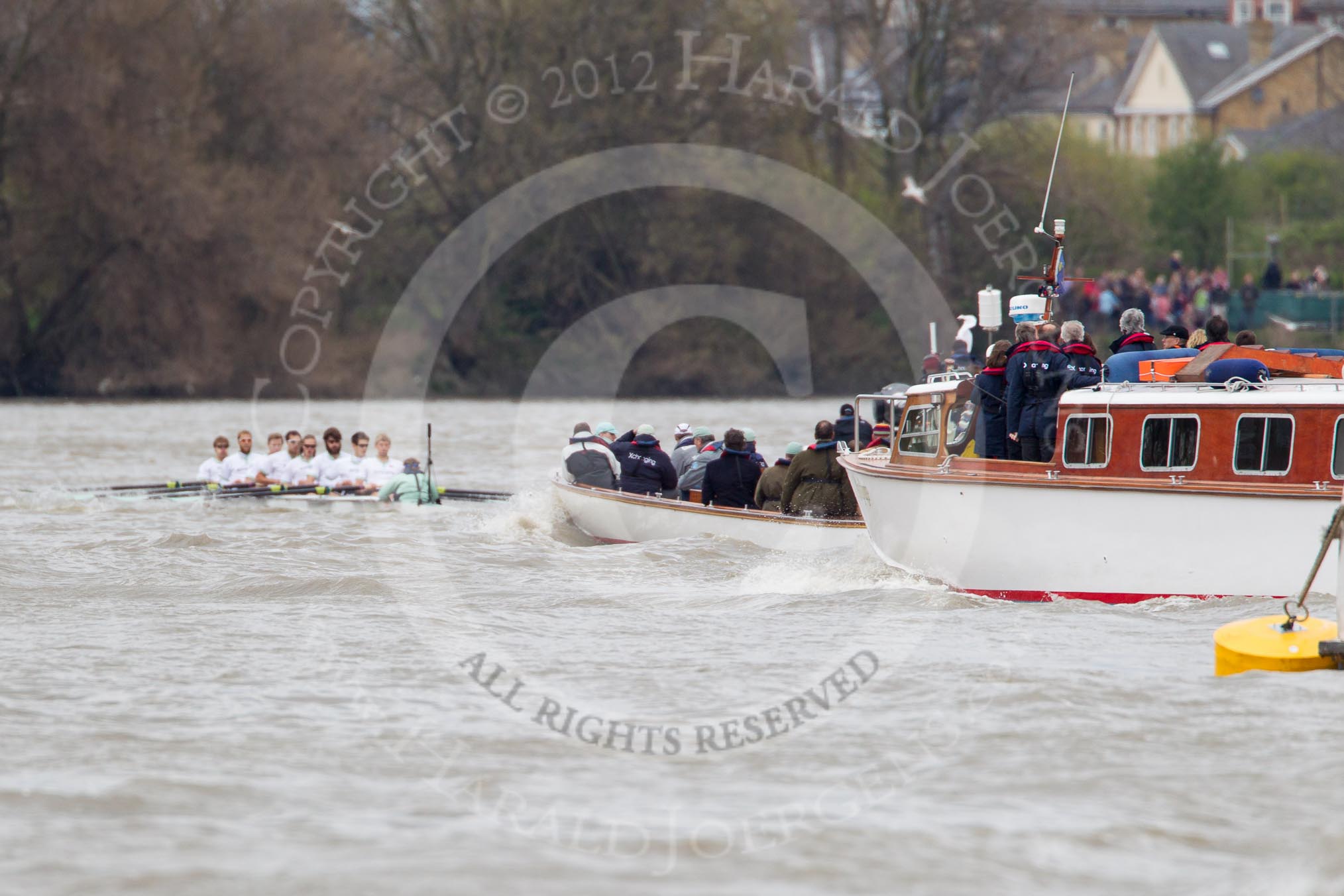 The Boat Race 2012: The 2012 Boat Race, with the boats approaching the Middlesex Bend: On the left the Cambridge Blue Boat, with the flotilla of boats behind..




on 07 April 2012 at 14:17, image #275