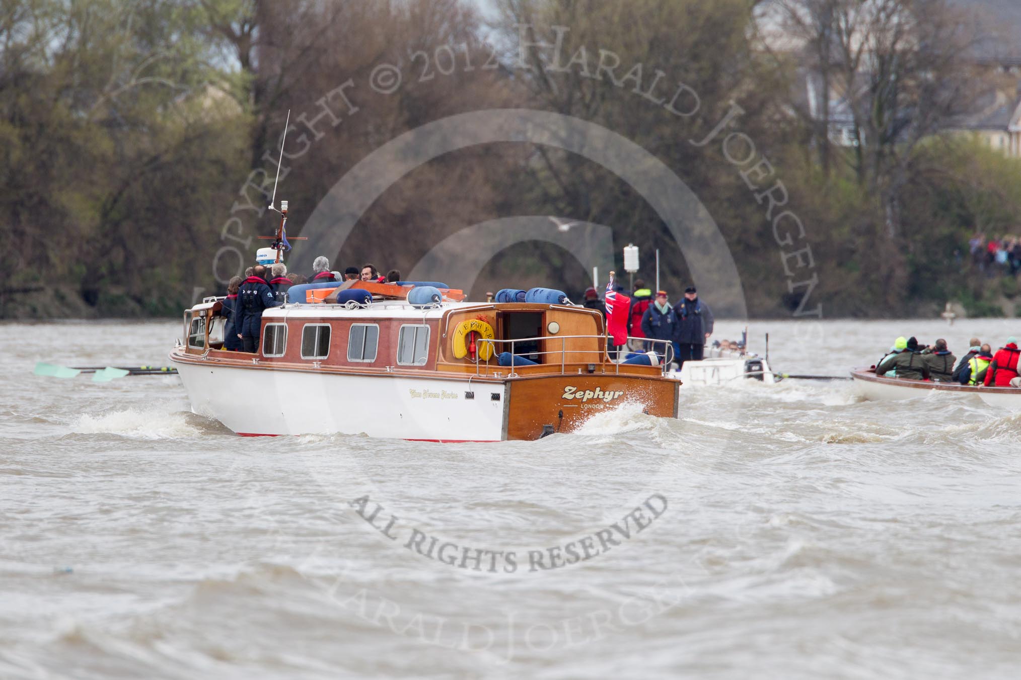 The Boat Race 2012: The 2012 Boat Race, with the boats approaching the Middlesex Bend: On the left the Cambridge Blue Boat, with the flotilla of boats behind..




on 07 April 2012 at 14:17, image #276