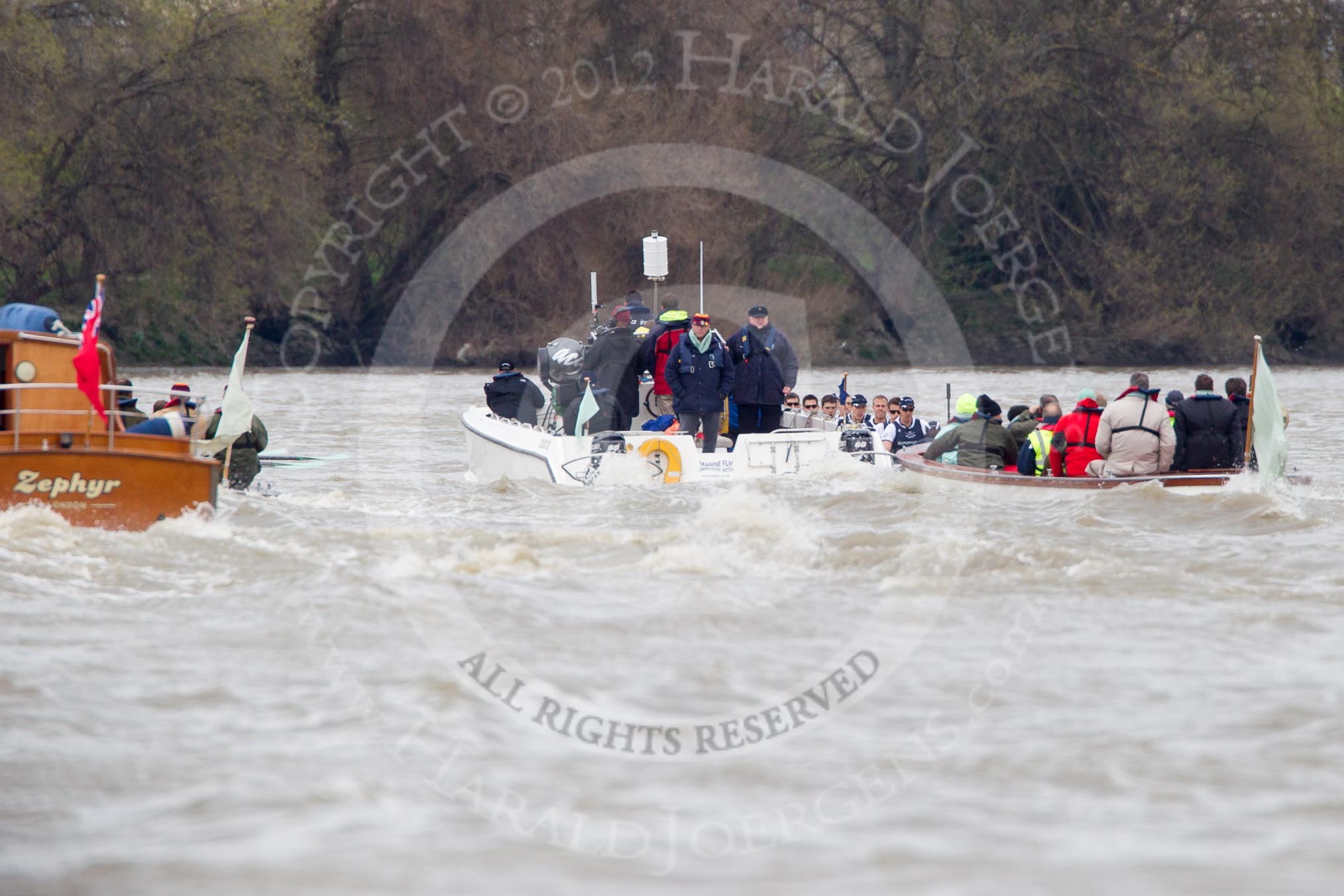 The Boat Race 2012: The 2012 Boat Race, with the boats approaching the Mile Post: The Oxford Blue Boat, with the boat carrying the race umpire and TV crews on the left..




on 07 April 2012 at 14:17, image #279