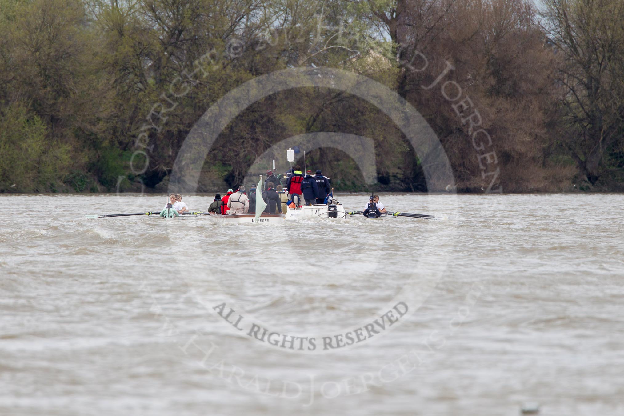 The Boat Race 2012: The 2012 Boat Race, with the boats approaching the Mile Post: The Cambridge Blue Boat on the left, Oxford Blue Boat on the right, and the boat carrying the race umpire and TV crews behind and in the middle..




on 07 April 2012 at 14:18, image #281
