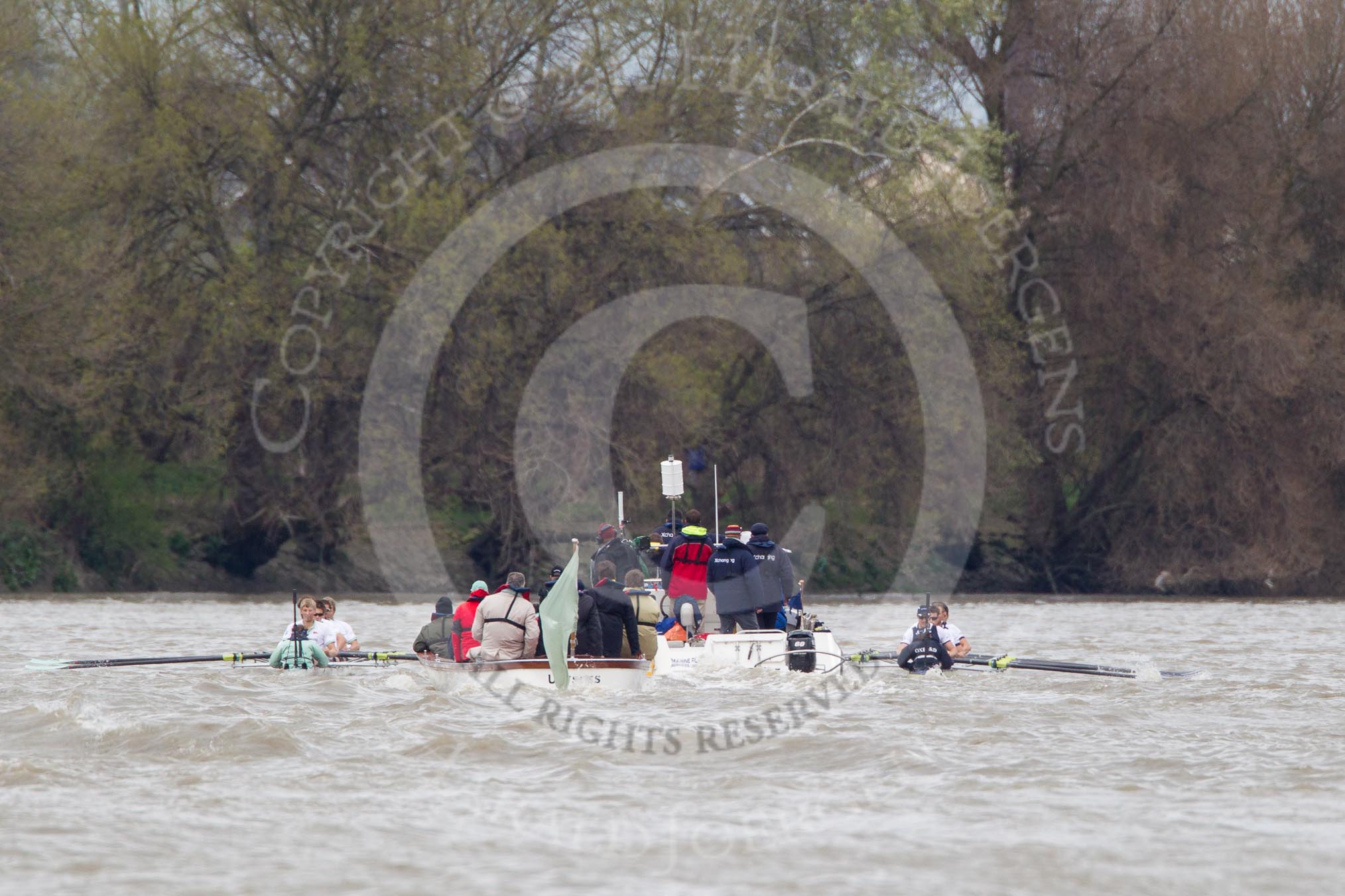 The Boat Race 2012: The 2012 Boat Race, with the boats approaching the Mile Post: The Cambridge Blue Boat on the left, Oxford Blue Boat on the right, and the boat carrying the race umpire and TV crews behind and in the middle..




on 07 April 2012 at 14:18, image #282