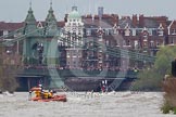 The Boat Race 2012: The 2012 Boat Race, with the boats approaching Hammersmith Bridge: The Cambridge Blue Boat on the left, nearly covered by the boat of the umpire, and the Oxford Blue Boat on the right..




on 07 April 2012 at 14:20, image #302