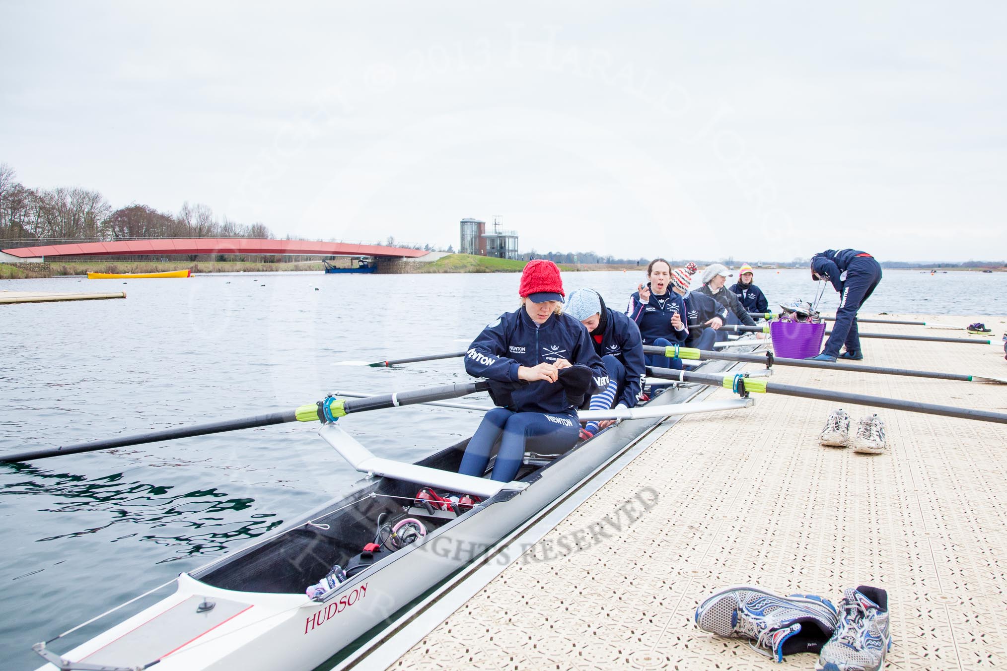 The Boat Race season 2013 - fixture OUWBC vs Molesey BC: OUWBC getting ready - stroke Maxie Scheske, seven Anastasia Chitty, six Harriet Keane, five Amy Varney, four Joanna Lee, three Mary Foord Weston, two Alice Carrington-Windo bow Mariann Novak, on the right cox Sophie Shawdon..
Dorney Lake,
Dorney, Windsor,
Berkshire,
United Kingdom,
on 24 February 2013 at 11:15, image #32