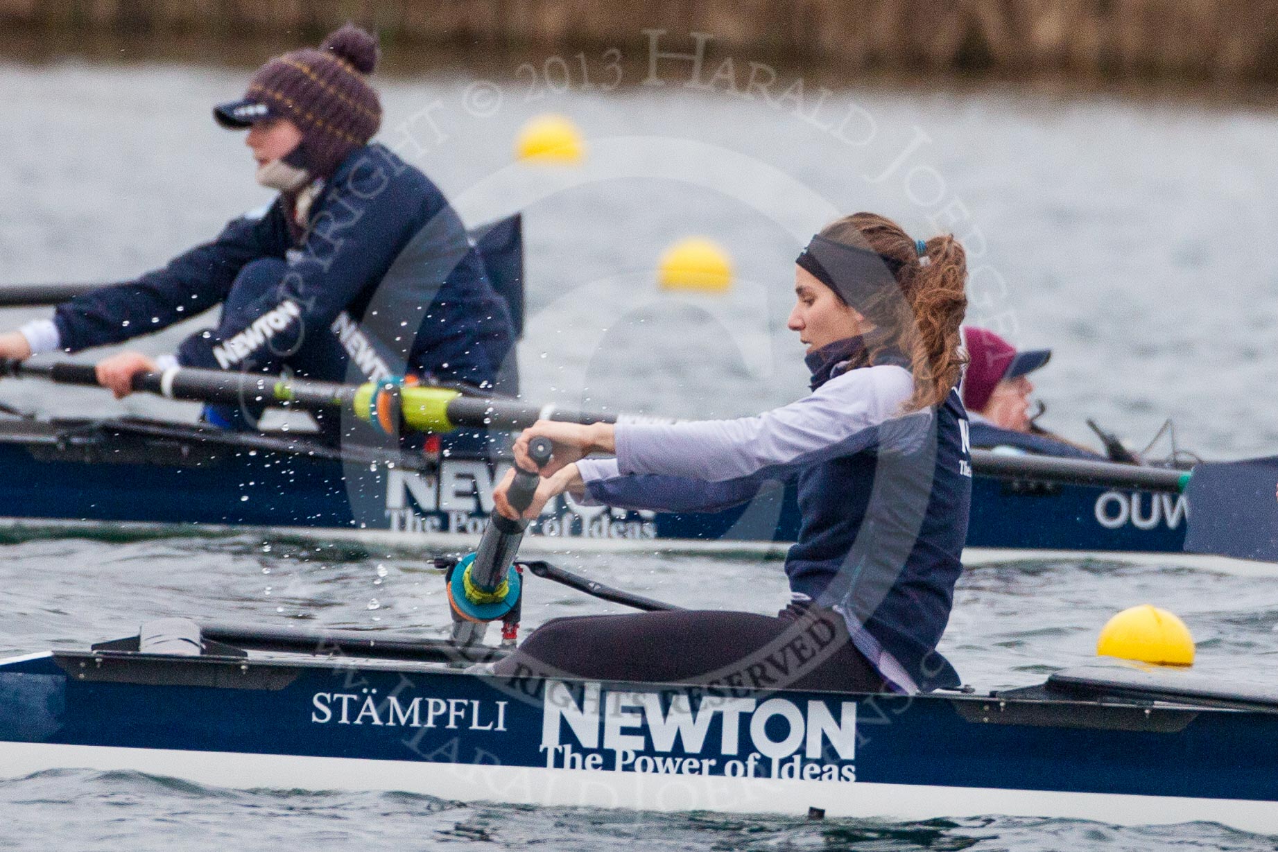 The Boat Race season 2013 - fixture OUWBC vs Molesey BC: Two OUWBC coxed fours racing each other, in the background bow Elspeth Cumber with Olivia Cleary coxing, in the foreground stroke Coralie Viollet-Djelassi in the second OUWBC boat..
Dorney Lake,
Dorney, Windsor,
Berkshire,
United Kingdom,
on 24 February 2013 at 12:19, image #134