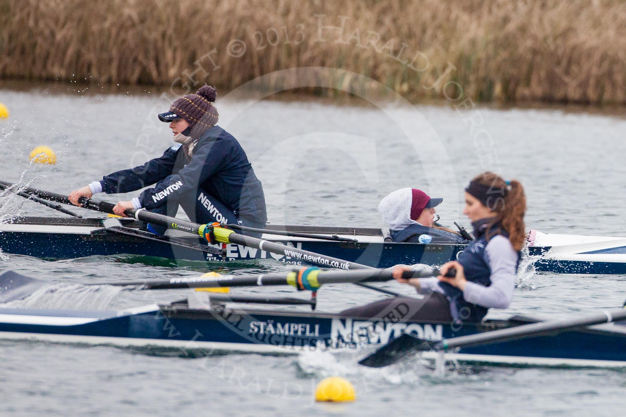 The Boat Race season 2013 - fixture OUWBC vs Molesey BC: Two OUWBC coxed fours racing each other, in the background bow Elspeth Cumber with Olivia Cleary coxing, in the foreground stroke Coralie Viollet-Djelassi in the second OUWBC boat..
Dorney Lake,
Dorney, Windsor,
Berkshire,
United Kingdom,
on 24 February 2013 at 12:19, image #135