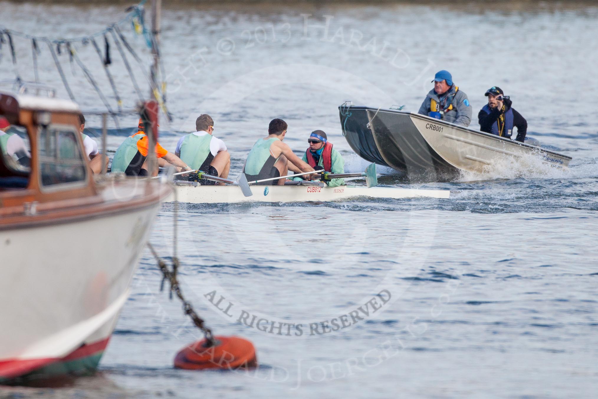The Boat Race season 2013 - fixture CUBC vs Leander: Goldie vs Imperial BC shortly after the start of their fixture - Imperial, on the left, and out of the frame, leading..
River Thames Tideway between Putney Bridge and Mortlake,
London SW15,

United Kingdom,
on 02 March 2013 at 15:23, image #27