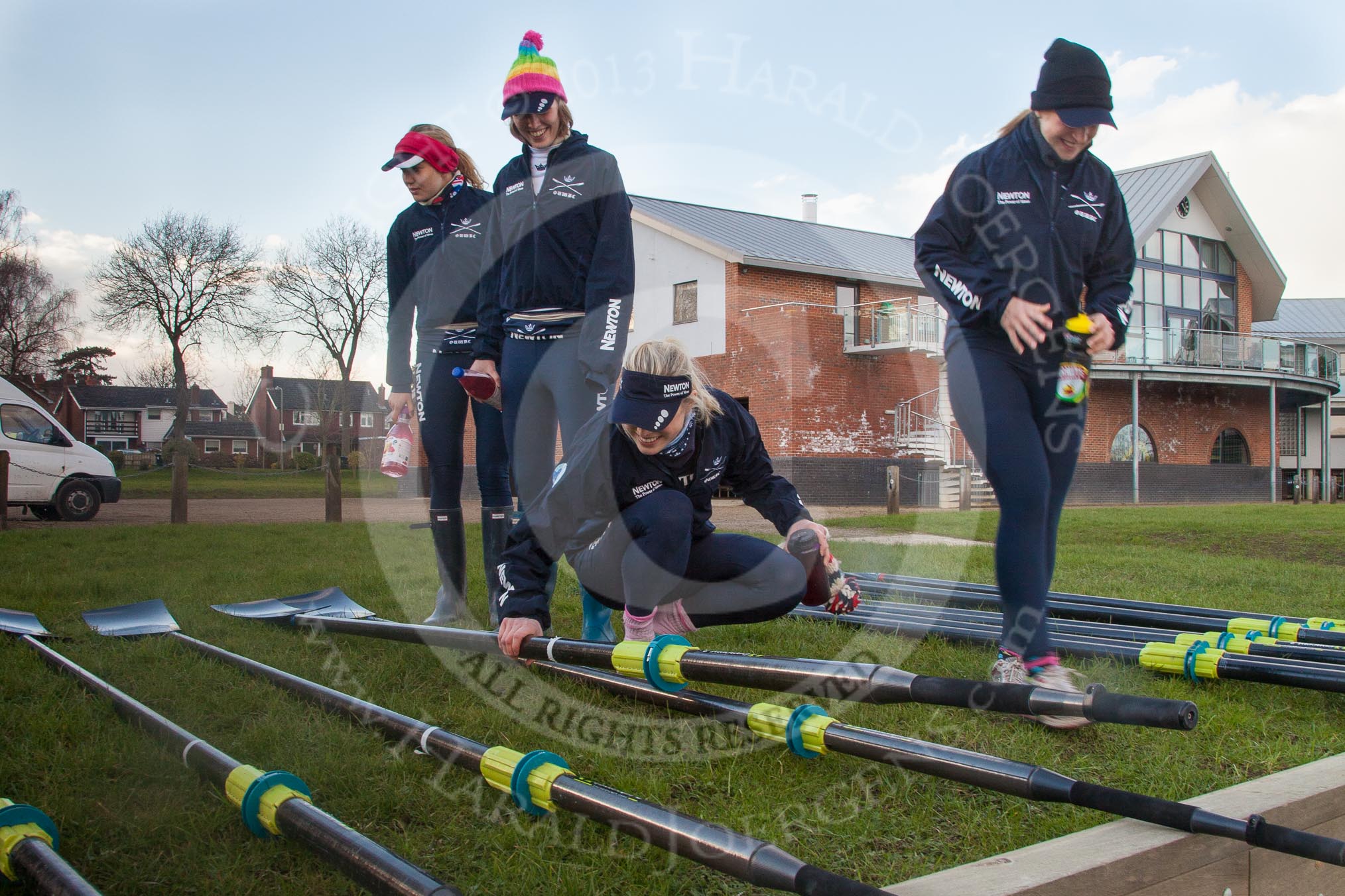 The Boat Race season 2013 - OUWBC training: At the Oxford University Fleming Boathouse inspecting the oars for the training session - Maxie Scheske, Alice Carrington-Windo, Amy Varney and Mary Foord-Weston..
Fleming Boathouse,
Wallingford,
Oxfordshire,
United Kingdom,
on 13 March 2013 at 16:25, image #7