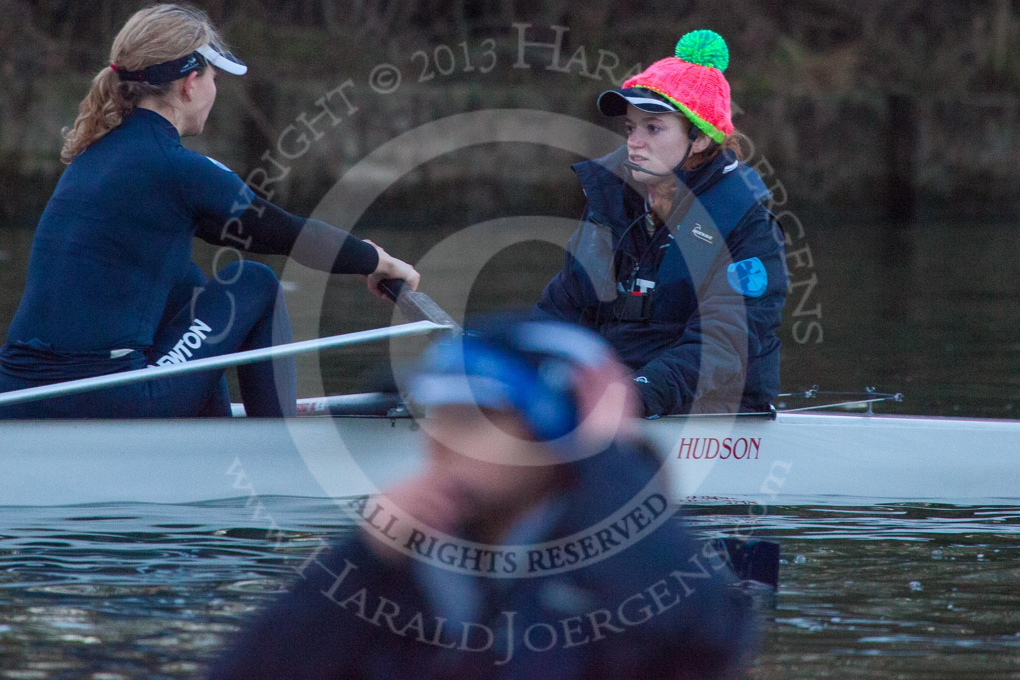 Photo 1303131800265D28421HaraldJoergens The Boat Race season 2013 - OUWBC training: The OUWBC Blue Boat racing Osiris, the reserve boat. In the Blue Boat stroke Maxie Scheske and cox Katie Apfelbaum, in Osiris, in front and out of focus, cox Sophie Shawdon..
River Thames,
Wallingford,
Oxfordshire,
United Kingdom,
on 13 March 2013 at 18:00, image #200