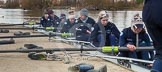 The Boat Race season 2013 - OUWBC training: The crew of Osiris, the OUWBC reserve boat, getting ready: Cox Sophie Shawdon, stroke Emily Chittock, then Annika Bruger, Caitlin Goss, Rachel Purkess, Eleanor Darlington, Hannah Ledbury, Elspeth Cumber,  and bow Coralie Viollet-Djelassi..
Fleming Boathouse,
Wallingford,
Oxfordshire,
United Kingdom,
on 13 March 2013 at 16:52, image #32