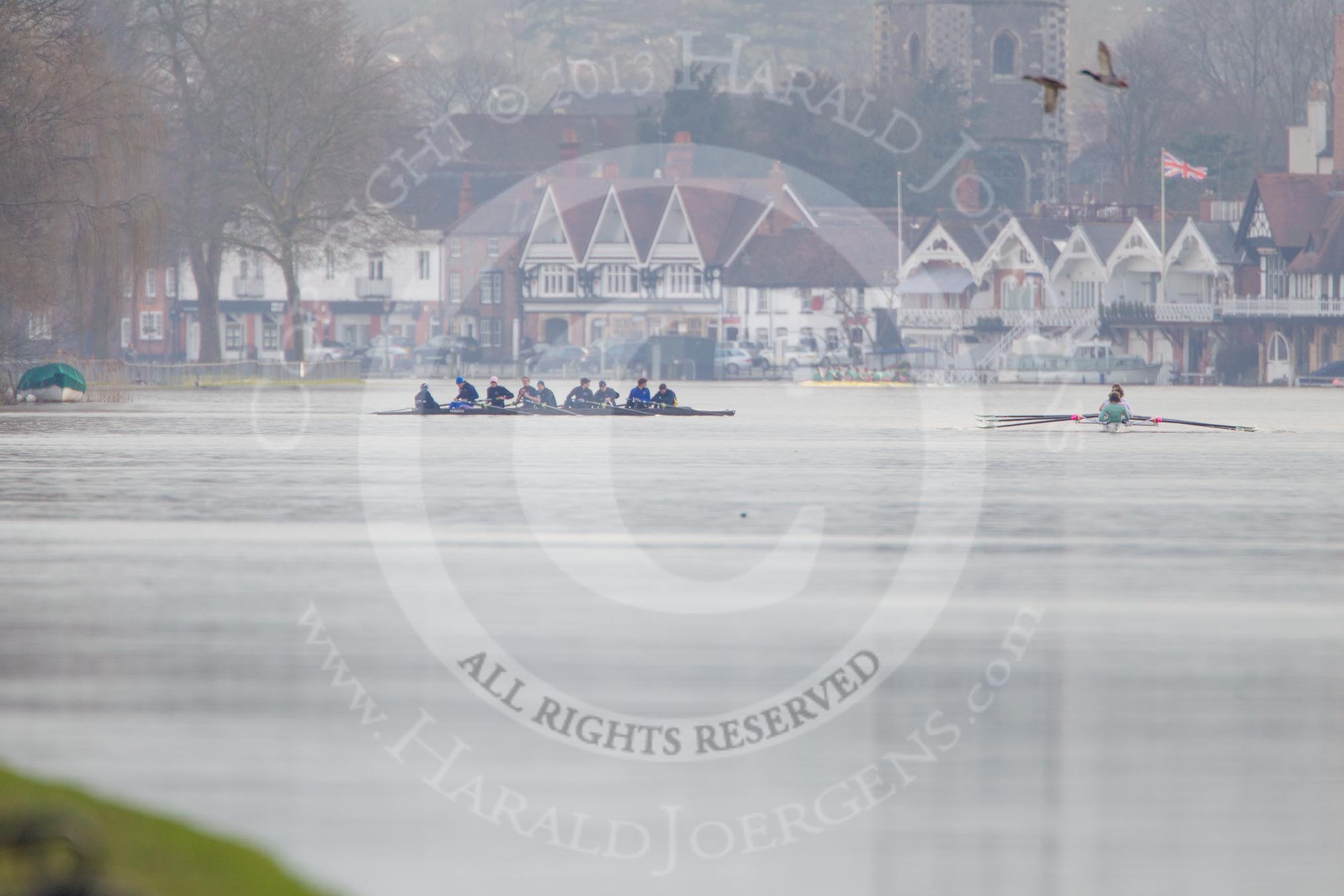 The Boat Race season 2013 - CUWBC training: The CUWBC Blue Boat and the OULBC boat on the River Thames with Henley-on-Thames in the background..
River Thames near Remenham,
Henley-on-Thames,
Oxfordshire,
United Kingdom,
on 19 March 2013 at 15:58, image #75