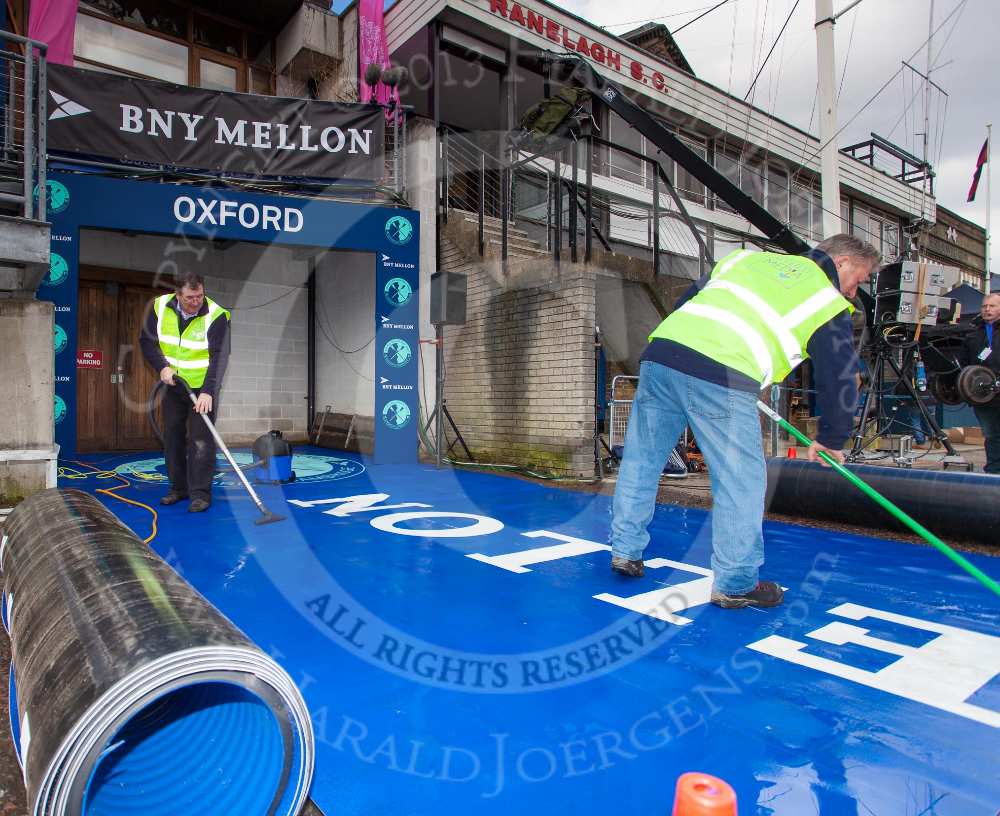 The Boat Race 2013: Cleaning the dark blue carpet for the Oxford squad, hours before the 2013 Boat Race..
Putney,
London SW15,

United Kingdom,
on 31 March 2013 at 11:06, image #5