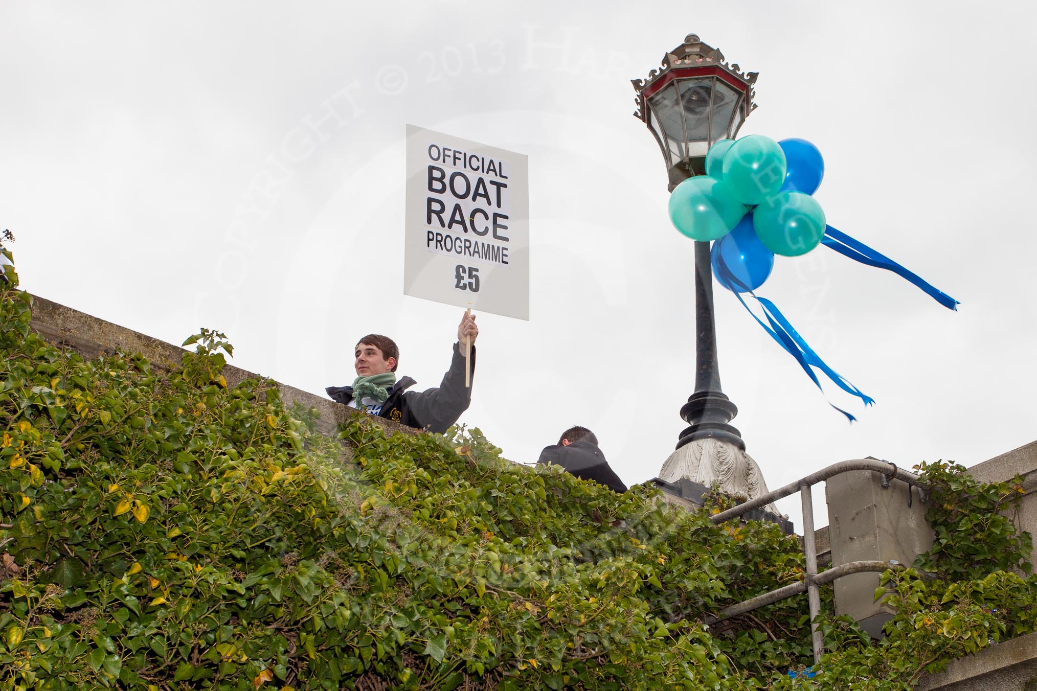 The Boat Race 2013: Looking up towards Putney Bridge hours before the start of the 2013 Boat Race - Official Boat Race Programmes on sale..
Putney,
London SW15,

United Kingdom,
on 31 March 2013 at 11:37, image #28