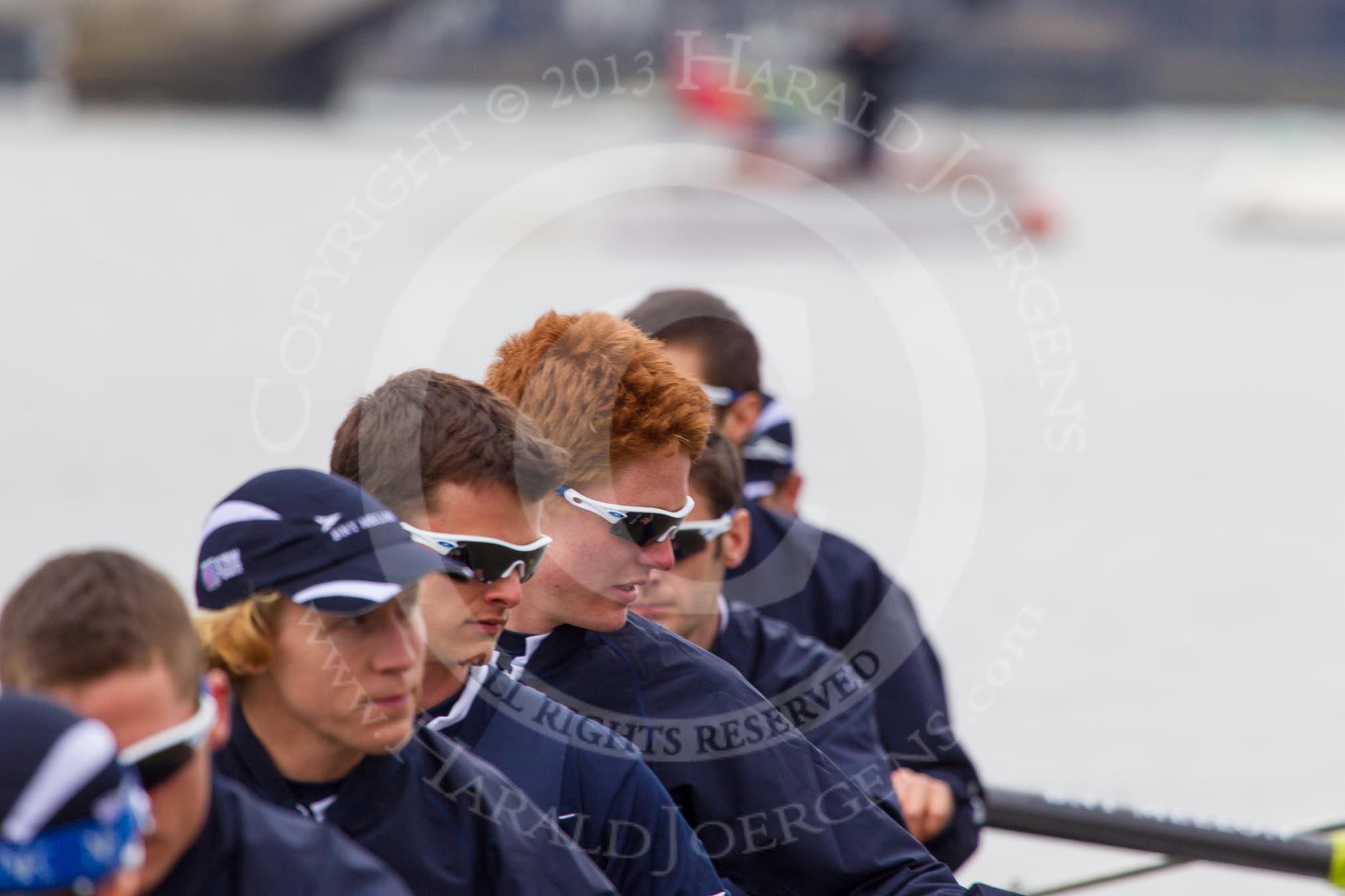 Photo 1303311516581D41475HaraldJoergens The Boat Race 2013: The crew of the Oxford reserve boat Isis getting ready for the Isis/Goldie race, here cox Laurence Harvey, stroke Thomas Watson, 7 seat Rev'd James Stephenson, 6 Benjamin French, 5 Joseph Dawson, 4 William Zeng, 3 Dr Alexander Woods, 2 Nicholas Hazell, and at bow Iain Mandale..
Putney,
London SW15,
United Kingdom,
on 31 March 2013 at 15:16, image #120
