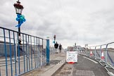 The Boat Race 2013: Preparations for thousands of Boat Race spectators on Putney Bridge, hours before the start of the 2013 Boat Race..
Putney,
London SW15,

United Kingdom,
on 31 March 2013 at 11:27, image #18