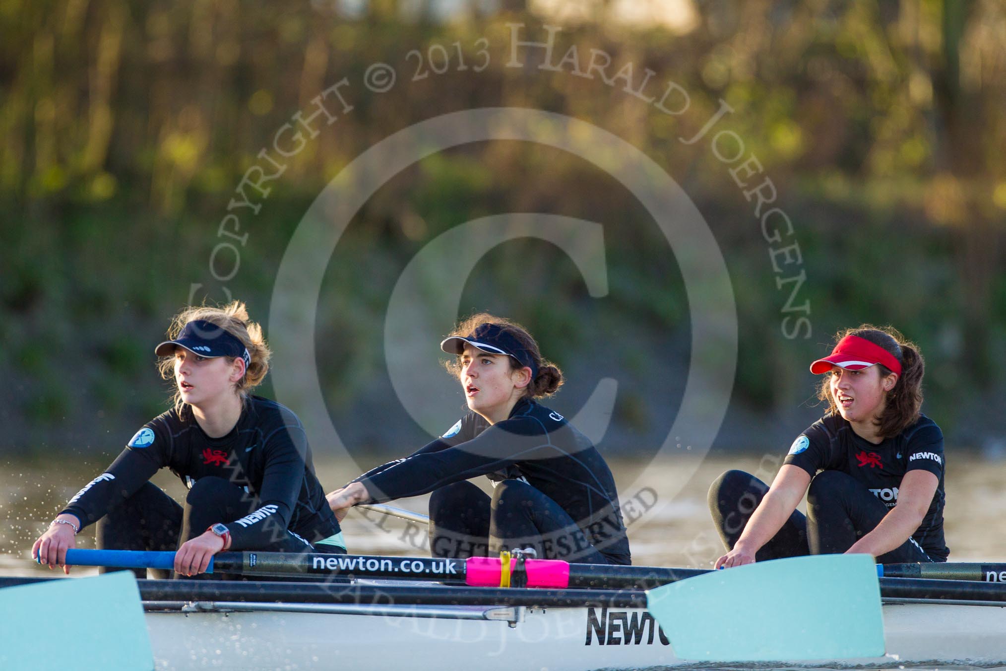 The Boat Race season 2014 - Women's Trial VIIIs(CUWBC, Cambridge): Wink Wink: 3 Hannah Roberts, 2 Sarah Crowther, Bow Ella Barnard..
River Thames between Putney Bridge and Mortlake,
London SW15,

United Kingdom,
on 19 December 2013 at 14:10, image #408
